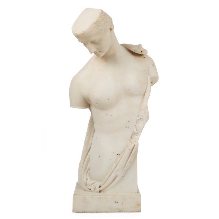 A very good chiseled marble sculpture of the goddess Psyche draped in a loose garb, it is a product of the Grand Tour and likely dates to the middle of the 19th century. The ancient sculpture that inspired this model was found in the amphitheater of