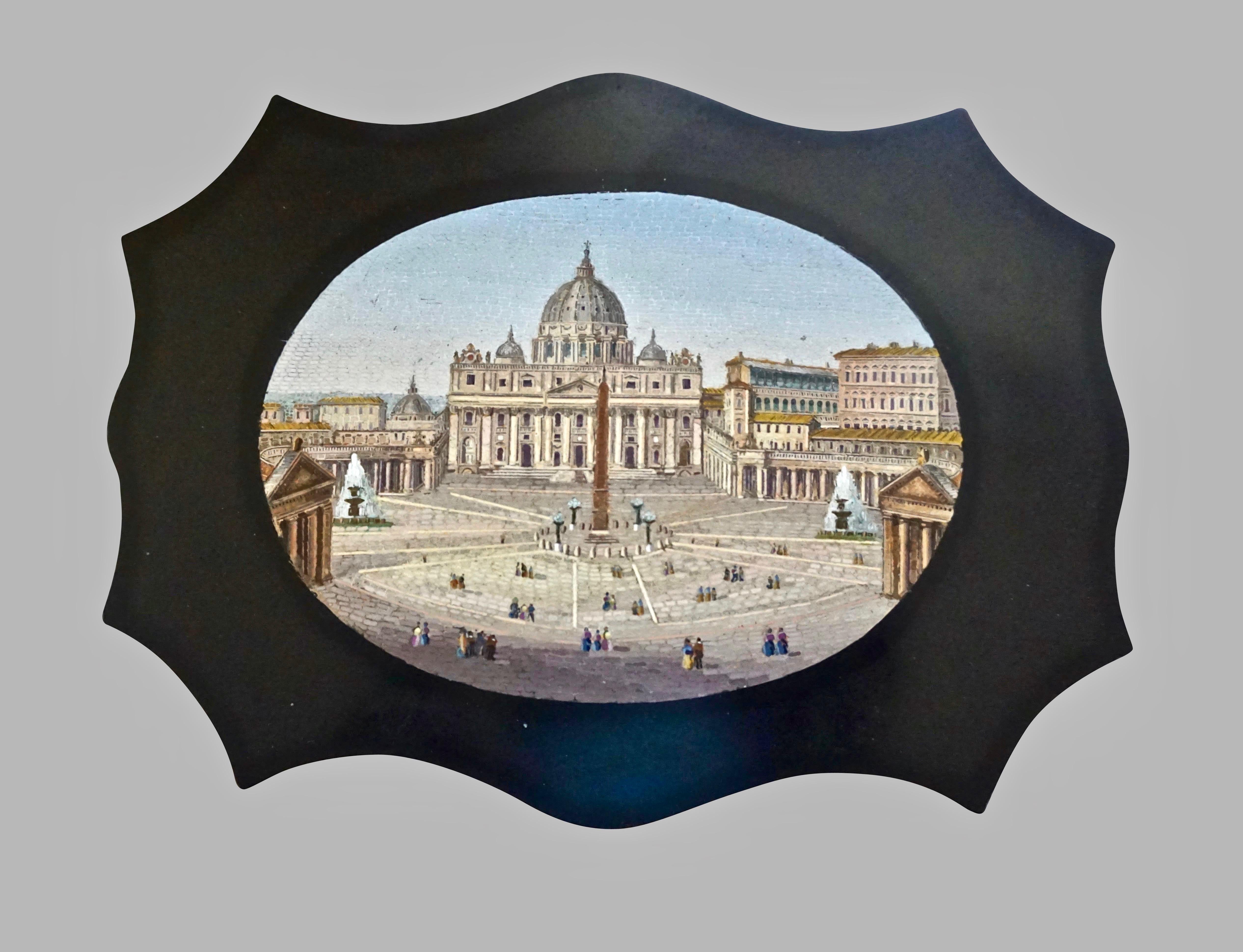 An Italian grand tour micromosaic black marble cartouche outline paperweight of the finest quality inset with a superb micro- mosaic depiction of St. Peter's Basilica. Label on verso 