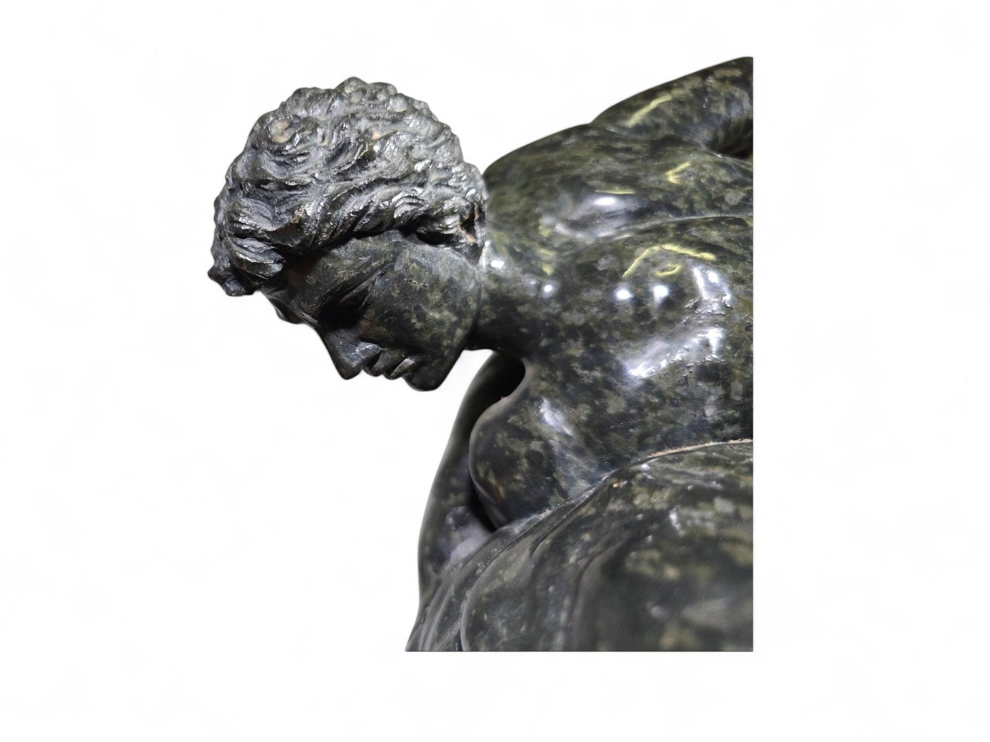 This exquisite 19th-century Italian sculpture is a finely carved representation of the iconic Uffizi Wrestlers, a classical subject celebrated for its dynamic portrayal of two wrestlers in a tense, intertwined pose. Crafted from serpentine marble,
