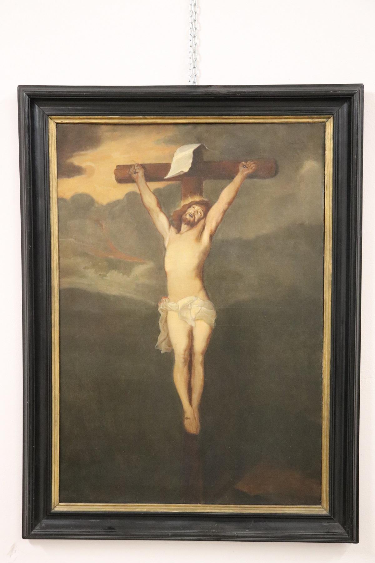 Great oil painting on canvas Crucifixion of Jesus scene. Excellent pictorial quality Jesus is depicted in the cross his face perfectly shows the pain. The body is made with excellent precision. The landscape at the back is very dark to underline