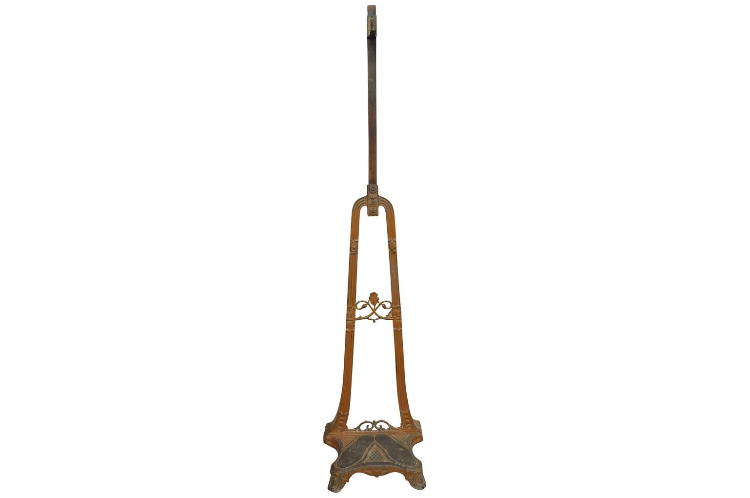 An intriguing 19th century Italian apparatus for measuring one's height in centimeters. Soundly constructed from cast iron with a bronze measure to one side. A whimsical accent perfect for any casual interior.