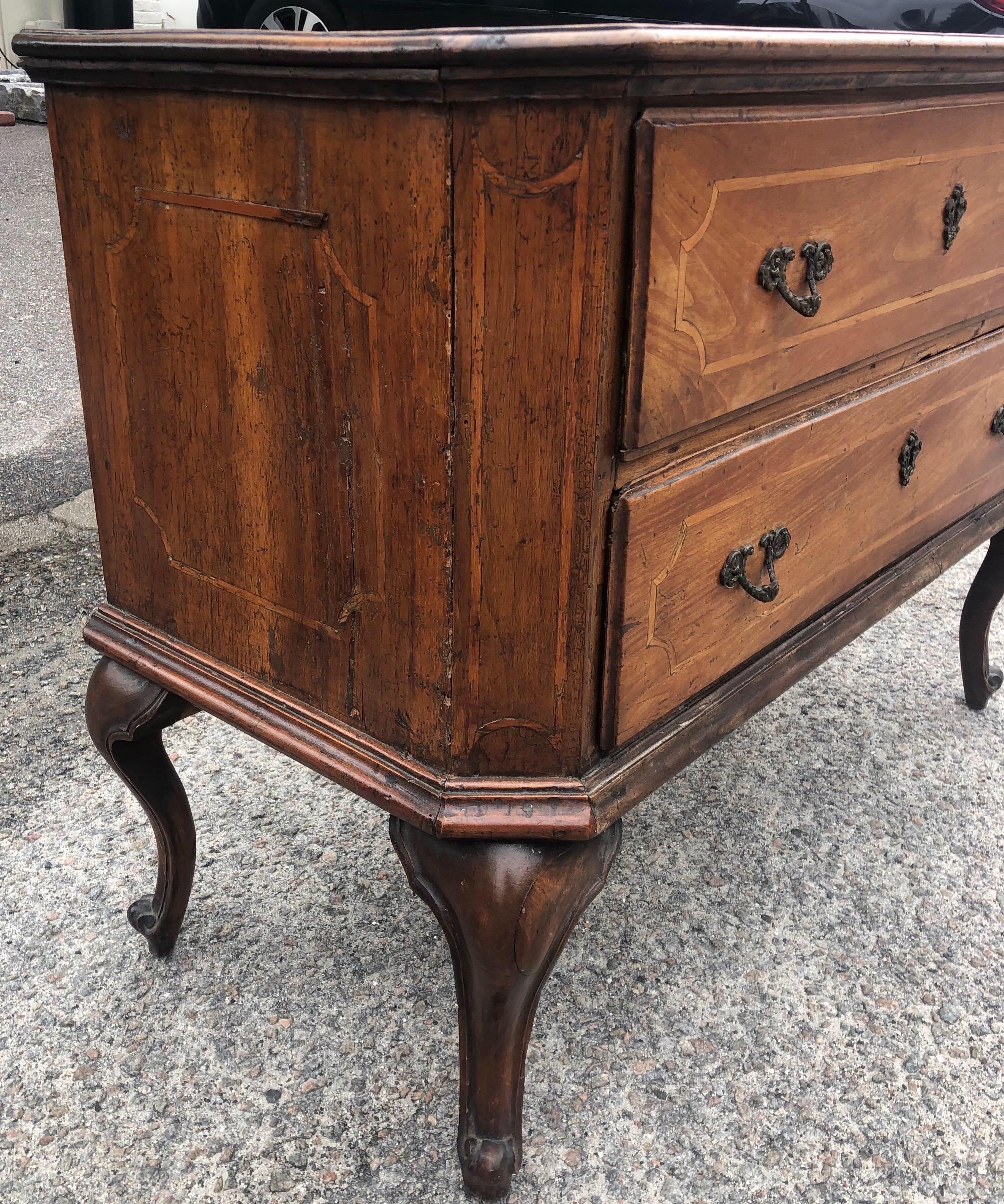 19th century Italian 2-drawer commode with inlay and cabriole legs. Beautiful patina on this walnut commode and great height and size.
