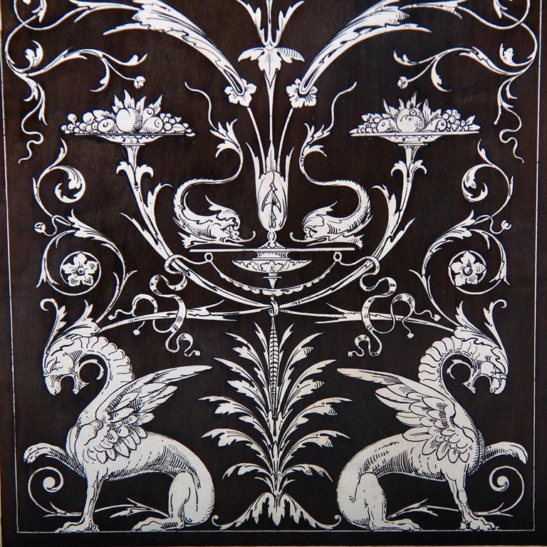 A 19th century Italian Renaissance-style single door cabinet in ebony, profusely inlaid with flowers, swags, leaves, griffons etc. of bone, the inlaid motifs further detailed with fine engraving.
The single inlaid door is flanked by pilasters, each