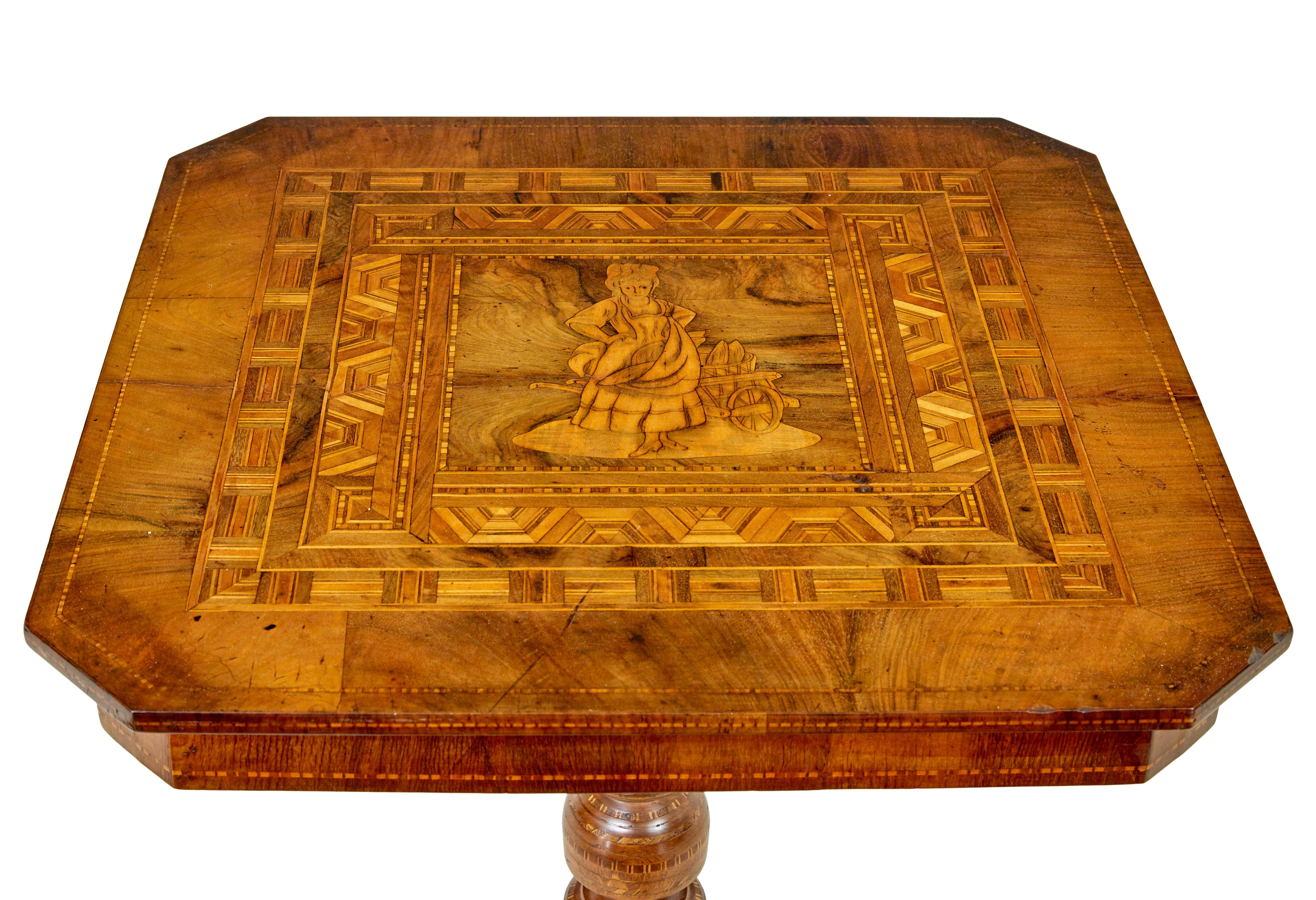 19th century Italian inlaid walnut sorrento table circa 1890.

Here we offer a profusely inlaid occasional table.

Octagonal shape, with a central inlaid female figure in traditional dress, bordered by a symmetrical design, with further stringing