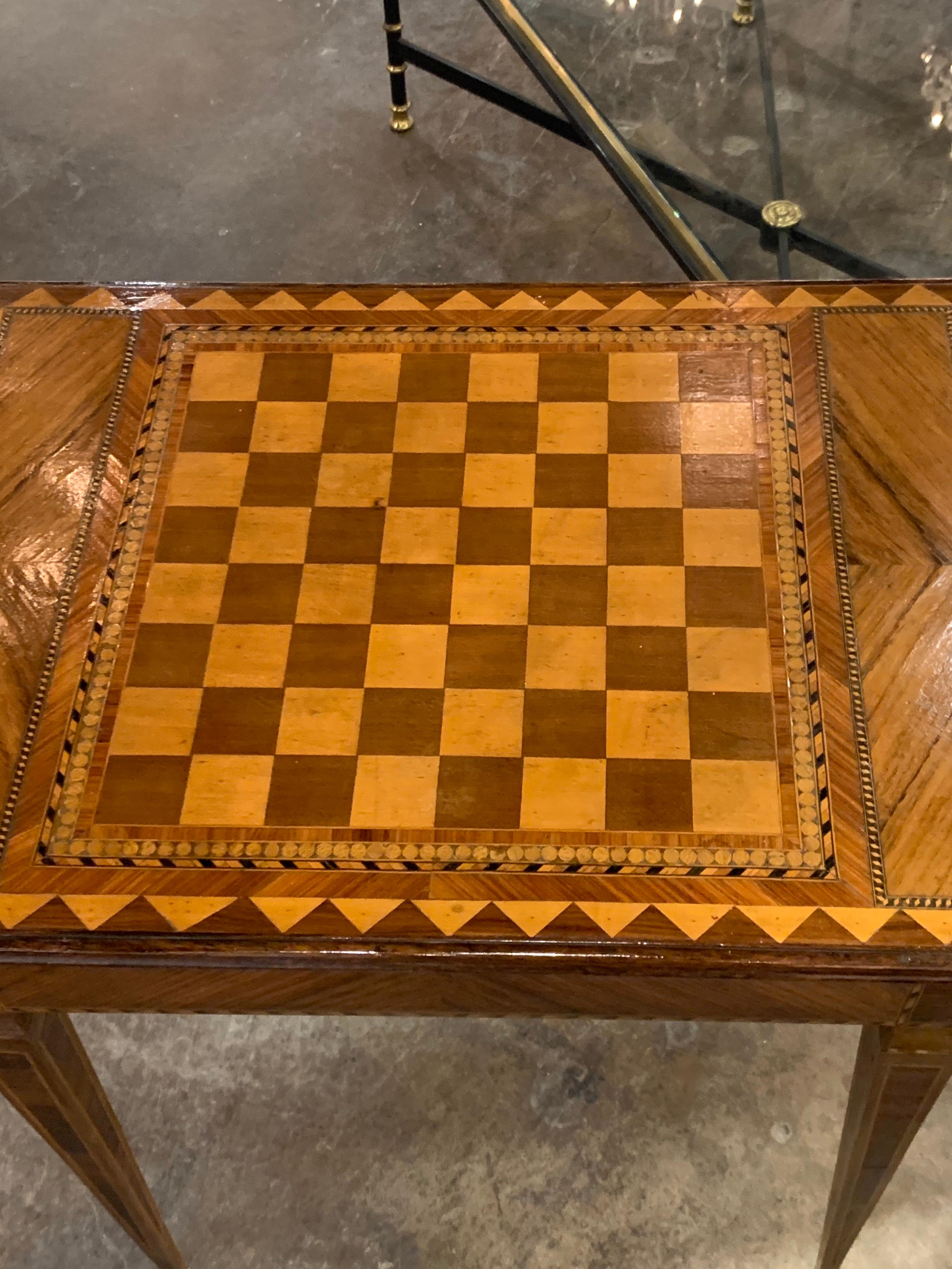 Decorative 19th century check board top side table made of kingwood, maple and mahogany. Beautiful inlaid pattern as well!