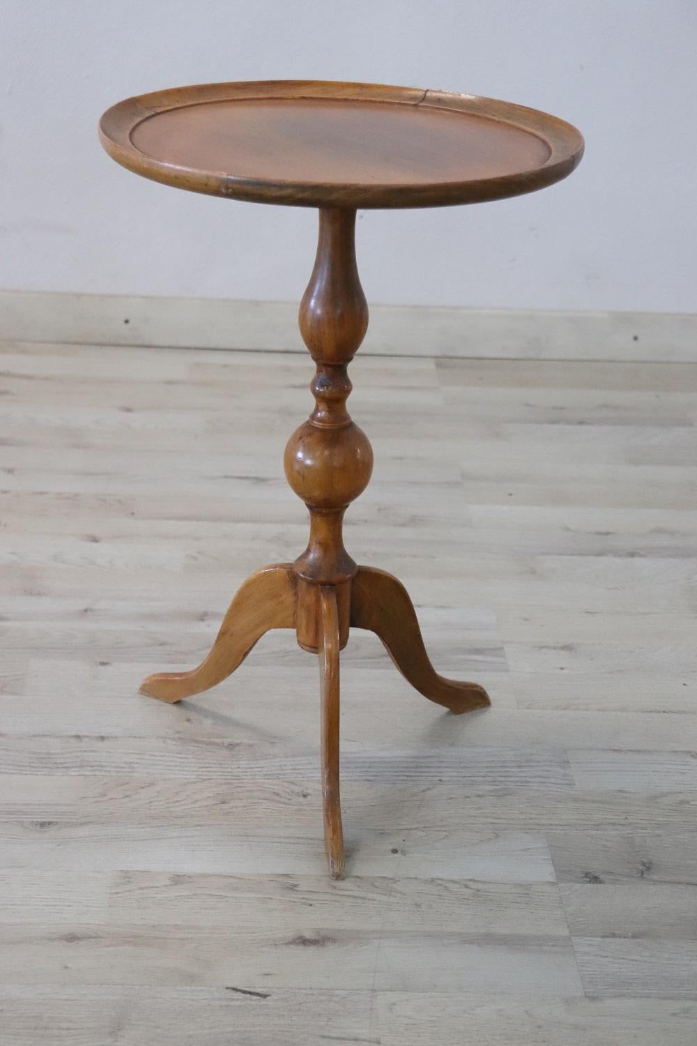 Rare and fine quality Italian round smoking table or pedestal table. The table presents a refined turned work in solid beech wood. Perfect to be used in your living room.
Used, perfect conditions.
 