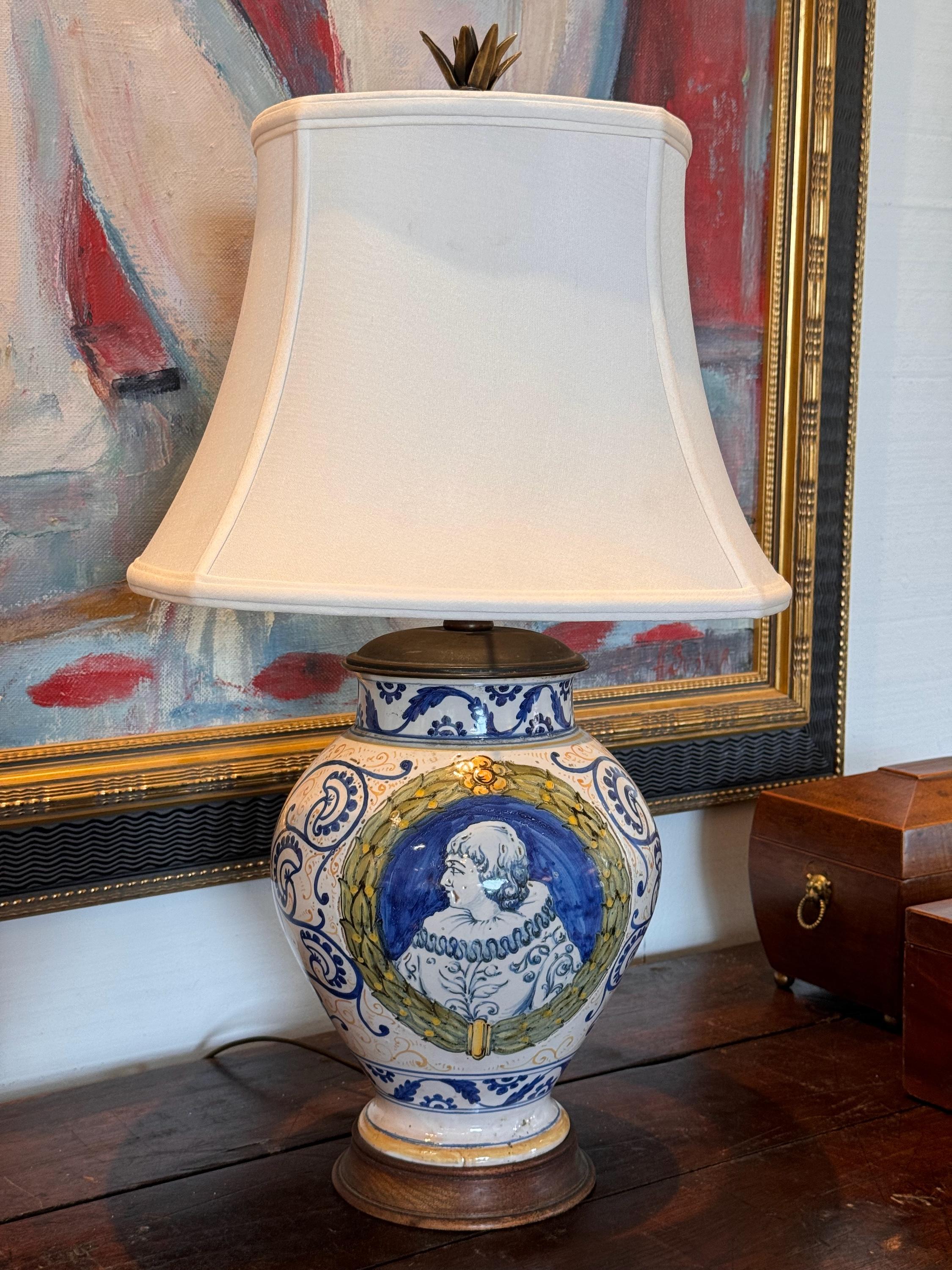 This is a beautiful lamp. It was crafted from an Italian jar.