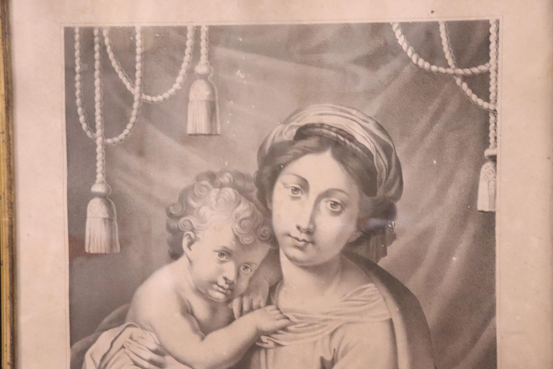 Beautiful religious collectible lithograph print. It represents an image of Madonna with Child, circa 1880s with wooden frame. Beautiful very sweet image with the Madonna who hugs Jesus tenderly.
  