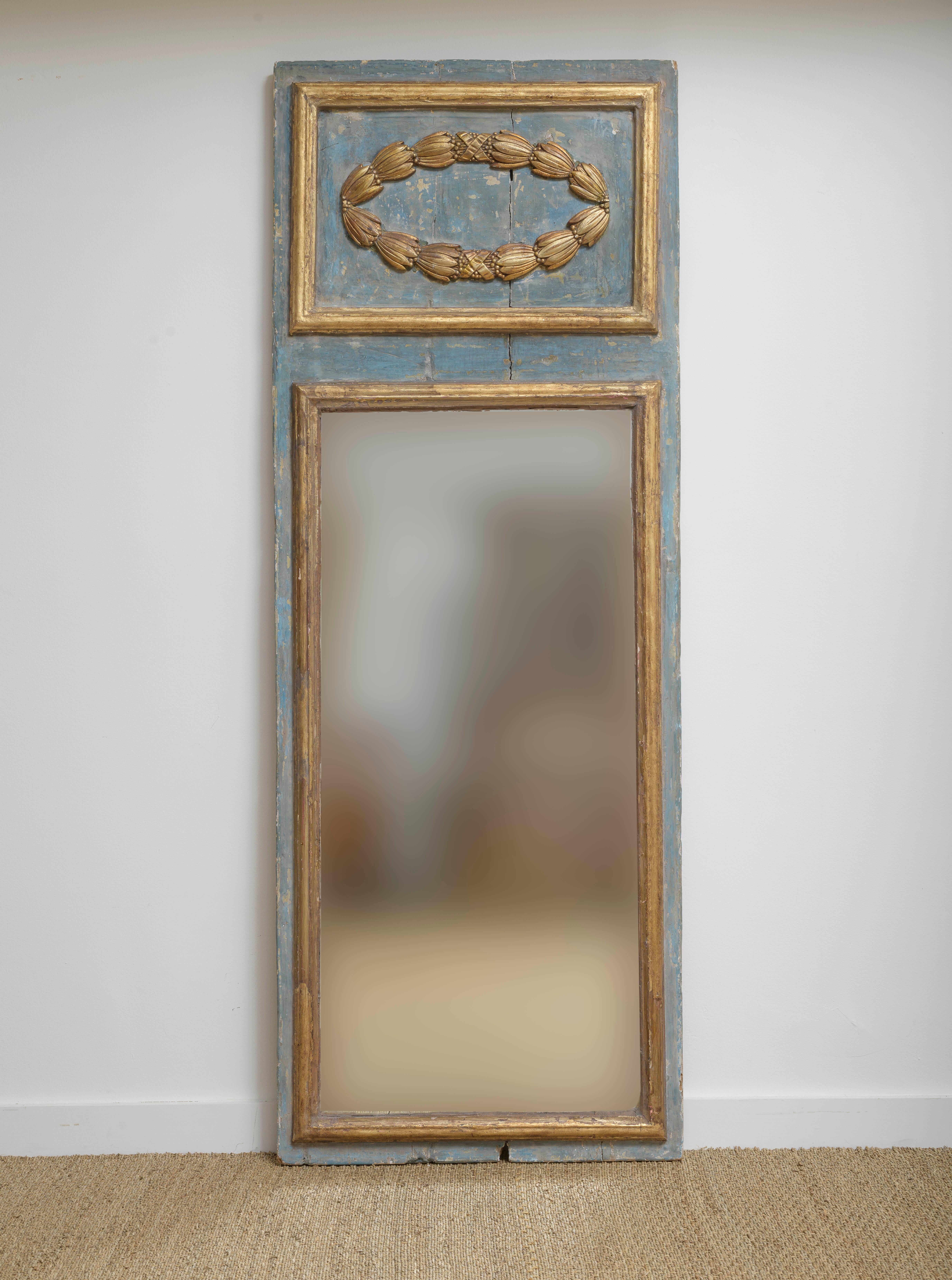 19th Century Italian Louis LXI Style Trumeau Mirror, Original mercury Glass.
Original blue and grey paint and gilding.  Original mercury glass  uniquely done in three parts with horizontal bevel.   