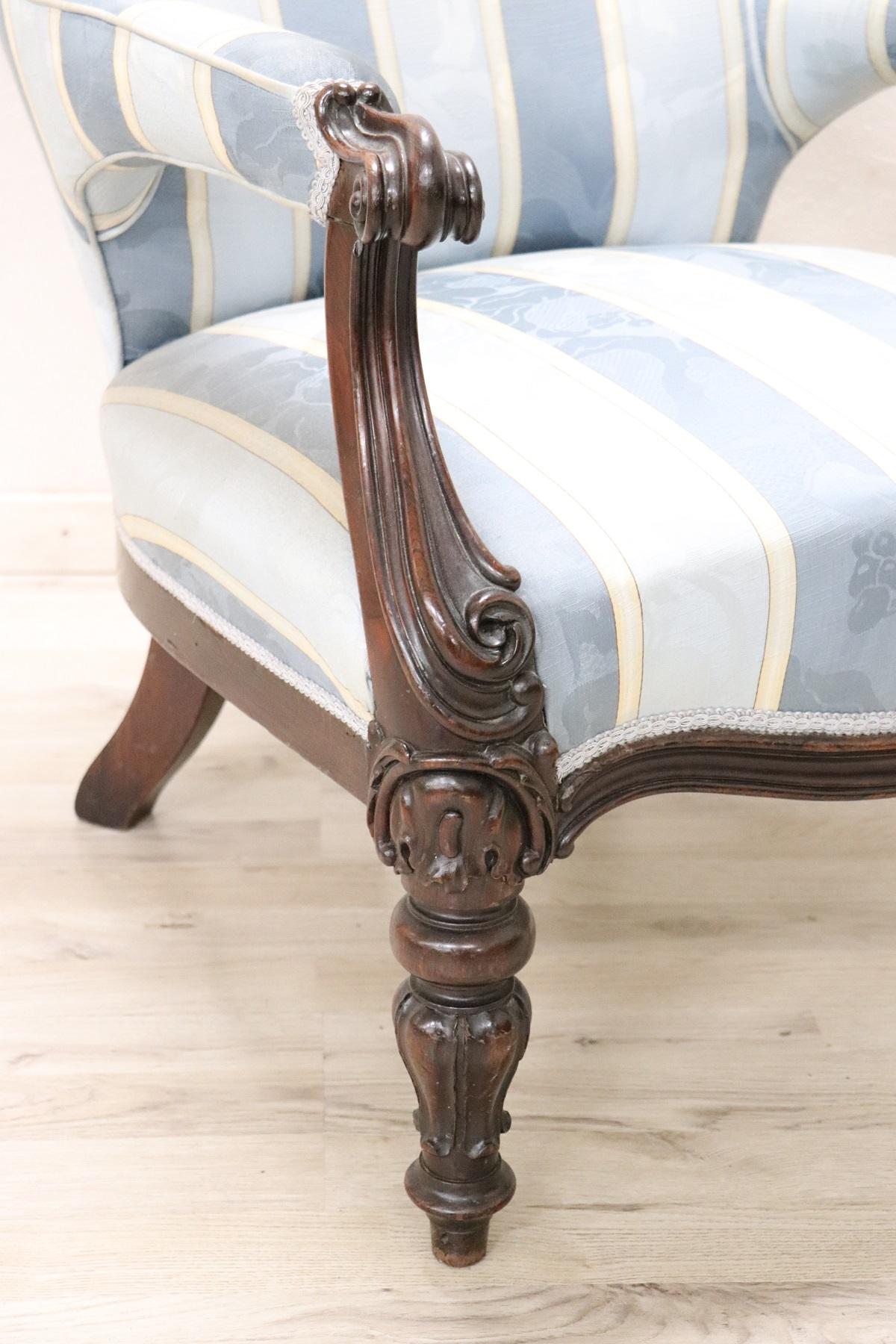 Louis Philippe Italian carved walnut antique armchair very comfortable. Front feet and armrests richly carved in walnut. Used but in perfect condition ready to be used in your beautiful home.