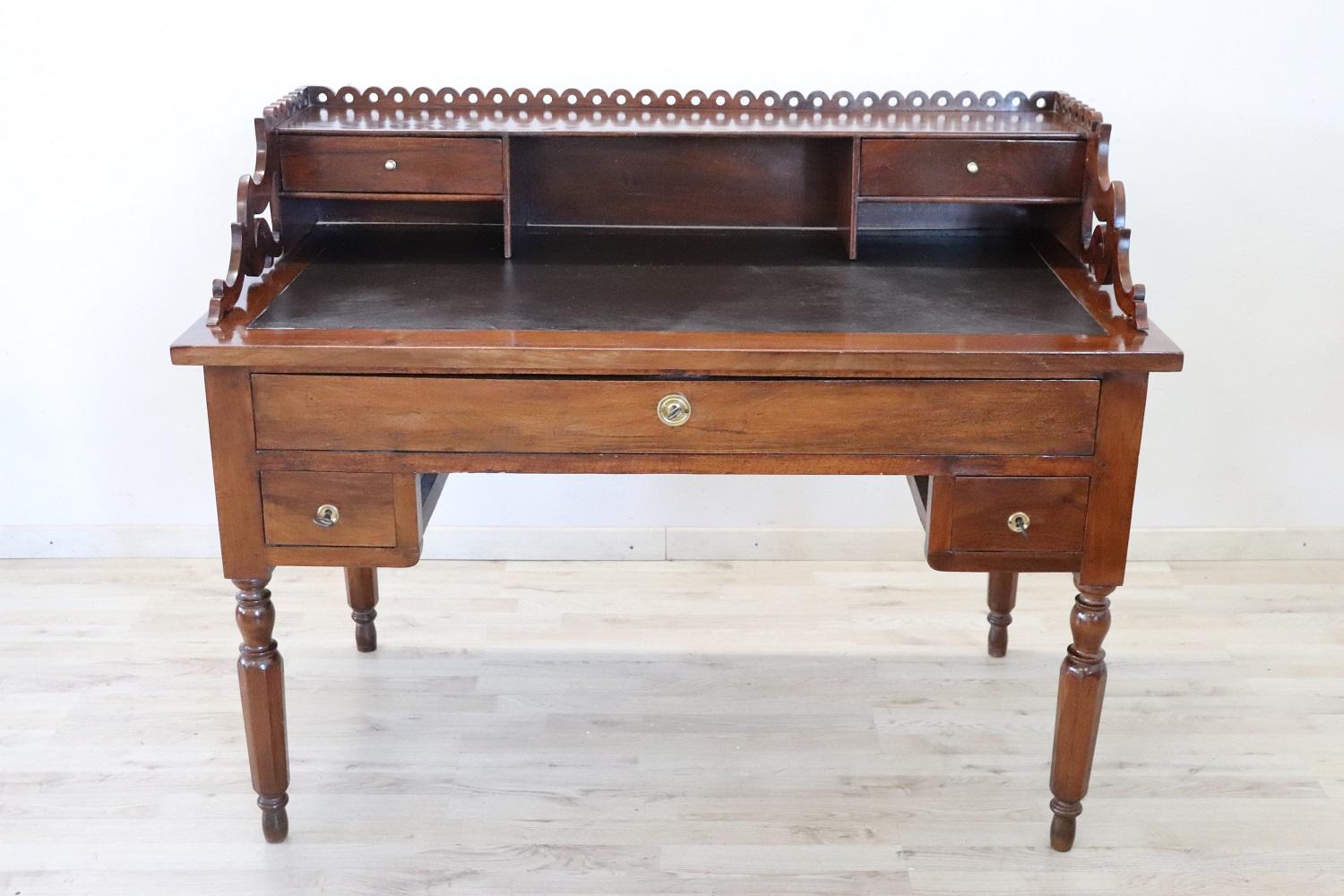 Elegant antique Italian writing desk. Rare and precious solid walnut wood. Comfortable size for a practical use. The desk has elegant turned legs. In the lower part three drawers and in the upper part two smaller drawers. Excellent condition ready