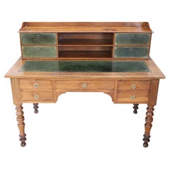 Bureau italien Louis Philippe du 19ème siècle en bois de noyer