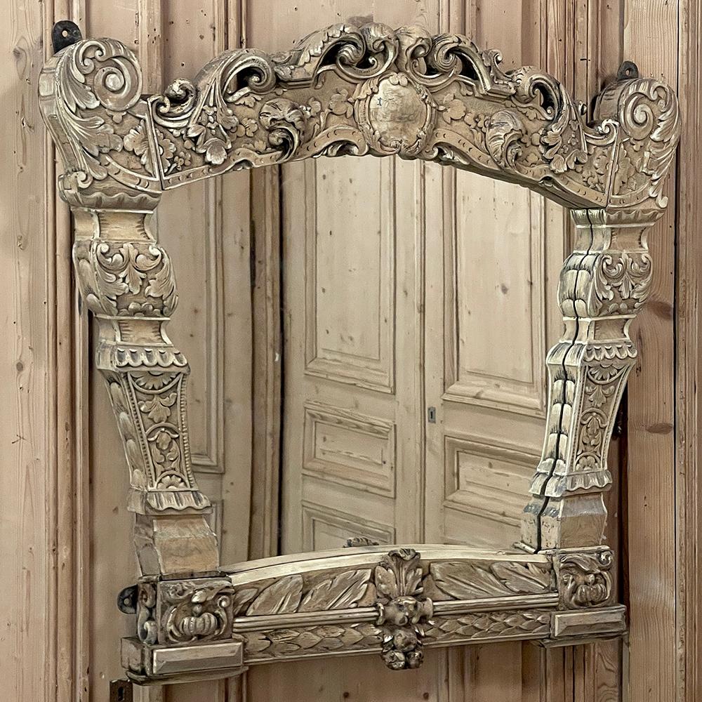 19th Century Italian Louis XIV Baroque Mirror in Stripped Fruitwood is a unique work, resembling the stern transom of an old sailing ship.  A plethora of classical motifs blend with Renaissance-inspired embellishment to create this special look. 