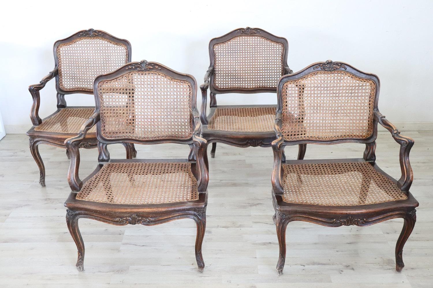 Very rare series of four armchairs production of Italy cabinetmakers in Louis XV style, 1880s. Beautiful wavy line with encabriole legs. Of great value is the original Vienna straw on the back and seat made with the ancient hand-woven method. Wide