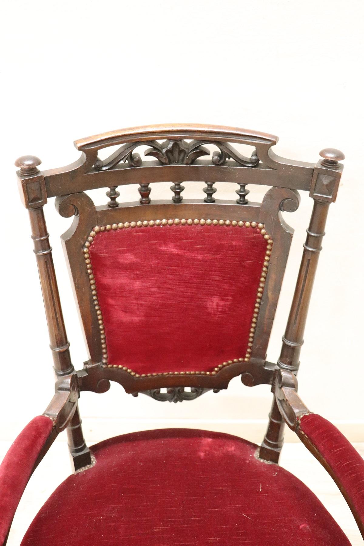 Italian armchair antique Louis XVI style with seat in elegant red velvet. The shape of the chair is very linear with straight legs in perfect Louis XVI taste. The back has particular carving work. Wide and comfortable seat. Beautiful armchair ideal