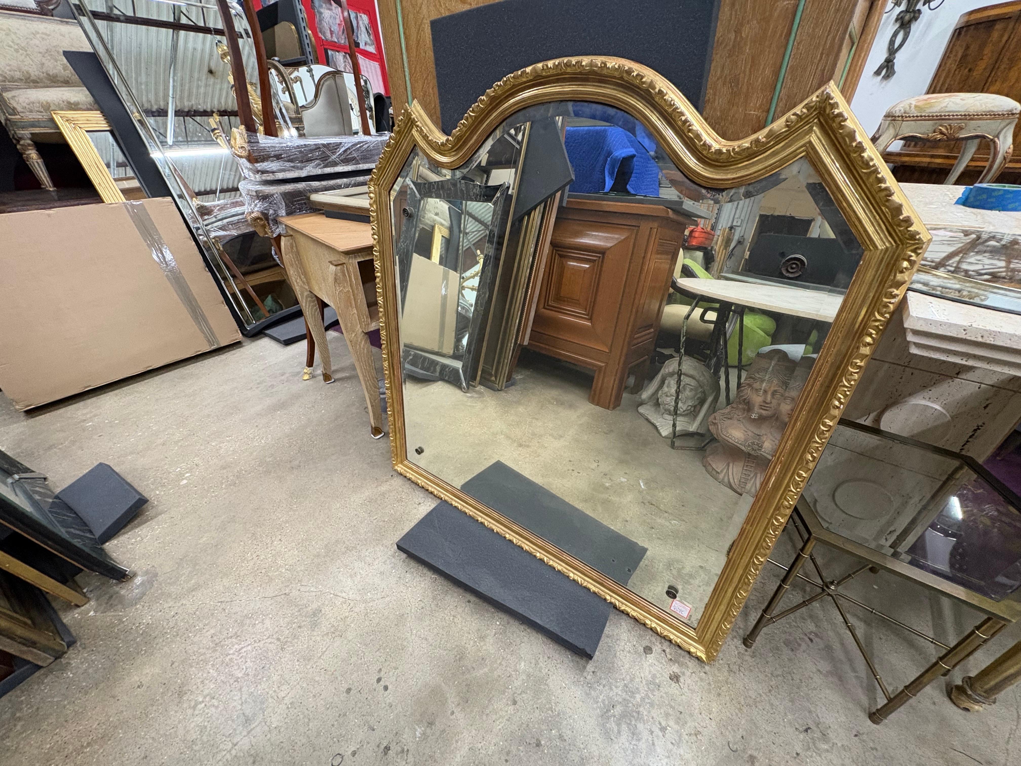  19th Century Italian Louis XVI Style Giltwood Mirror.
Offered is a shapely 19th century Italian giltwood Louis XVI style or Louis Philippe beveled mirror with beautiful details. This versatile antique Italian mirror would look great above a console