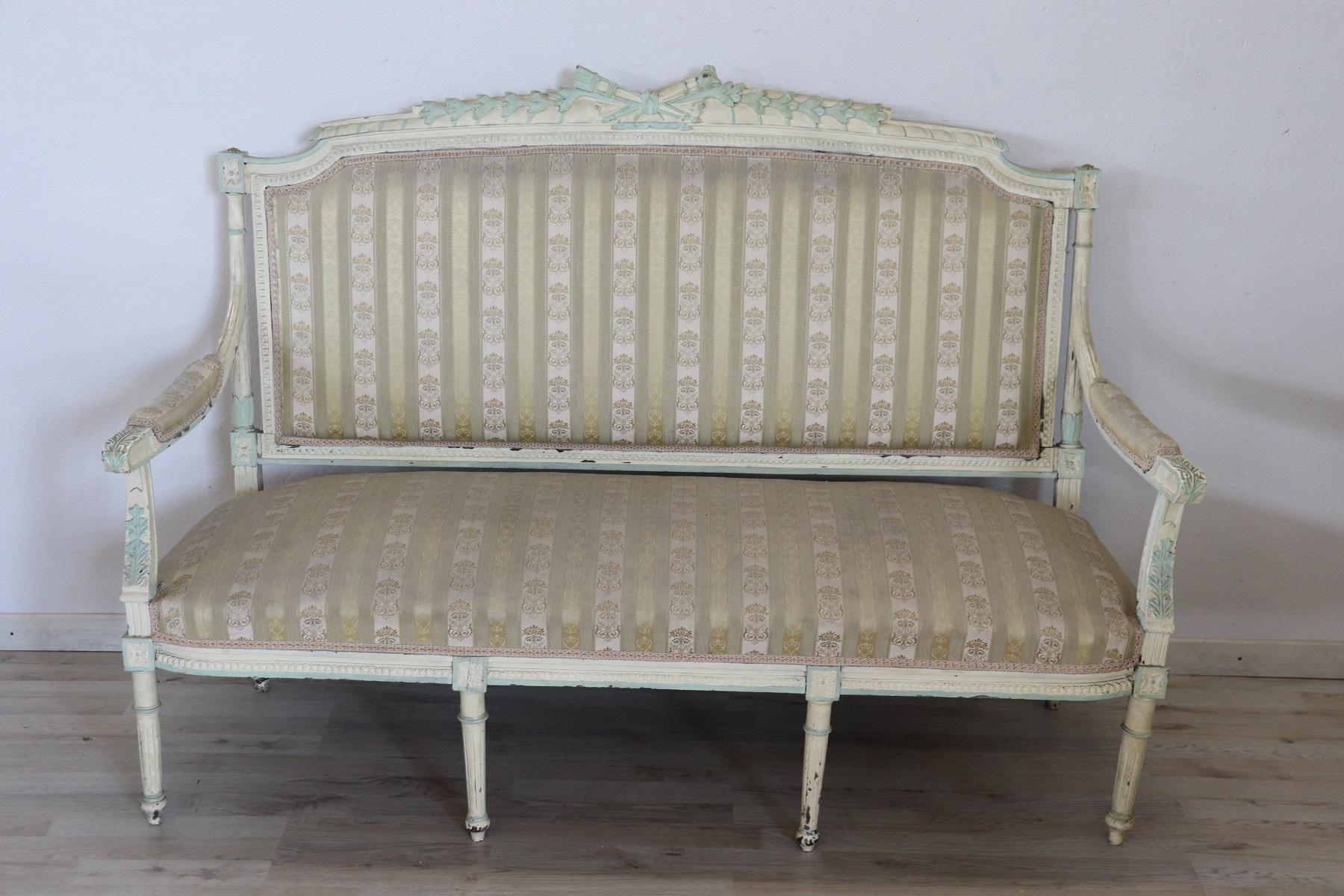 Rare complete Italian luxury Louis XVI style living room set includes:
1 large sofa
2 armchairs
4 chairs
Refined living room set in lacquared wood. The living room comes from an important Italian villa and embellished the central hall dedicated