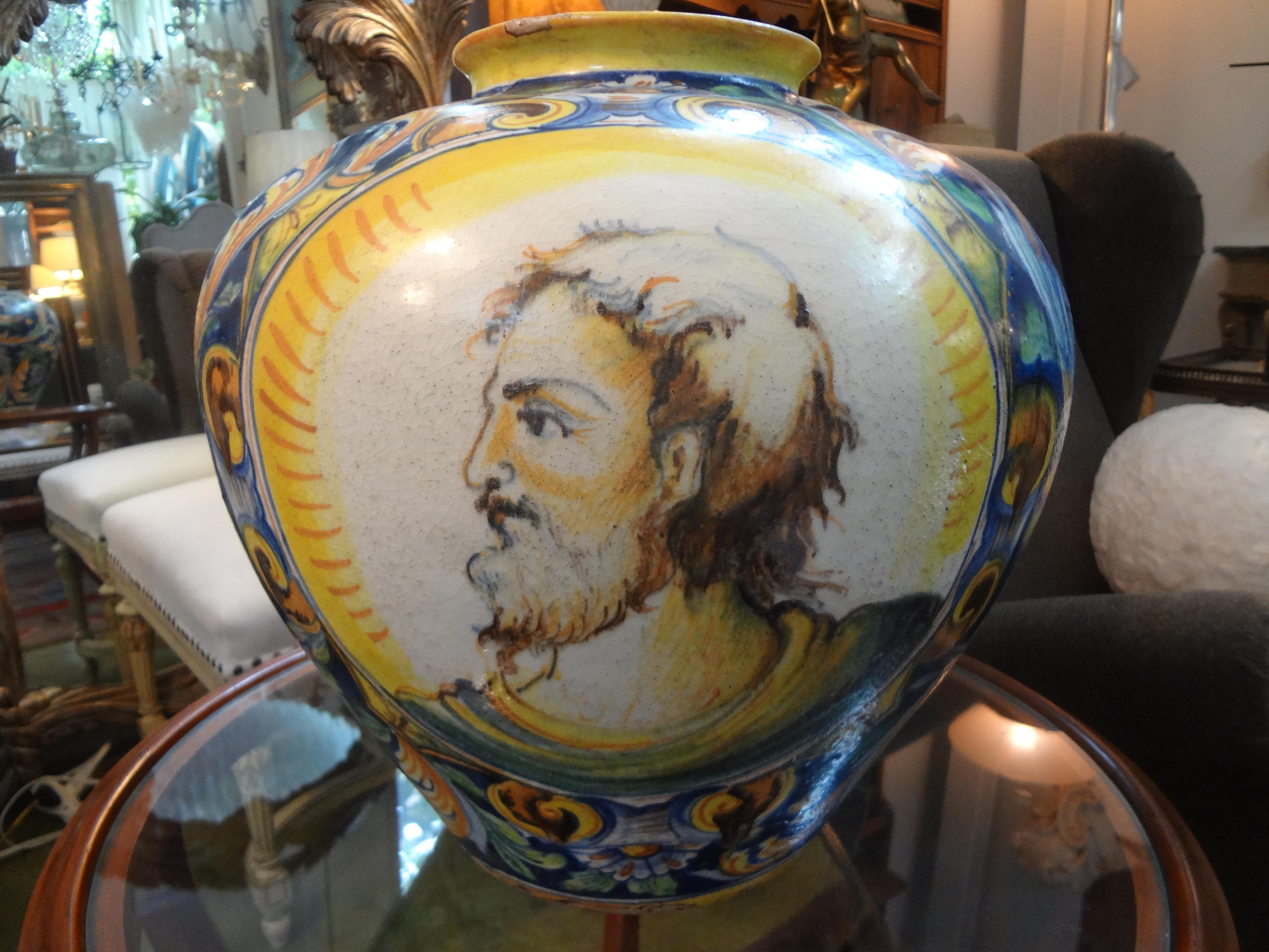 Italian maiolica urn.
Fantastic early 20th century Italian faience, maiolica, majolica or tin glazed earthenware vessel, vase or urn. This colorful hand decorated Classical Roman urn has a portrait of a man on one side. This very interesting example