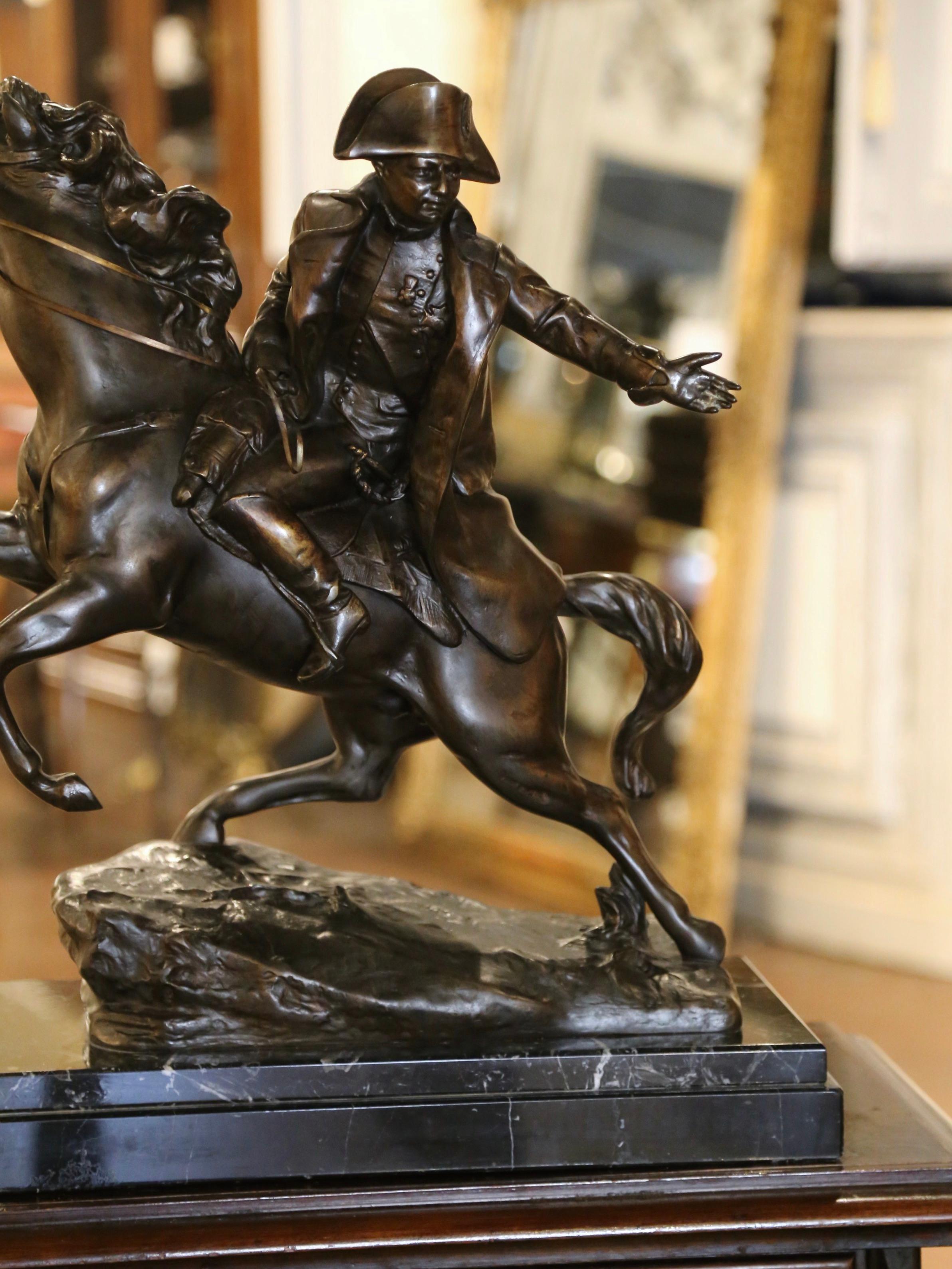 Decorate a man's study or office with this elegant antique figure of Napoleon on his horse. Crafted in Italy circa 1890 and standing on a heavy rectangular base, the sculpture depicts the French Emperor Napoleon Bonaparte his arm outstretched