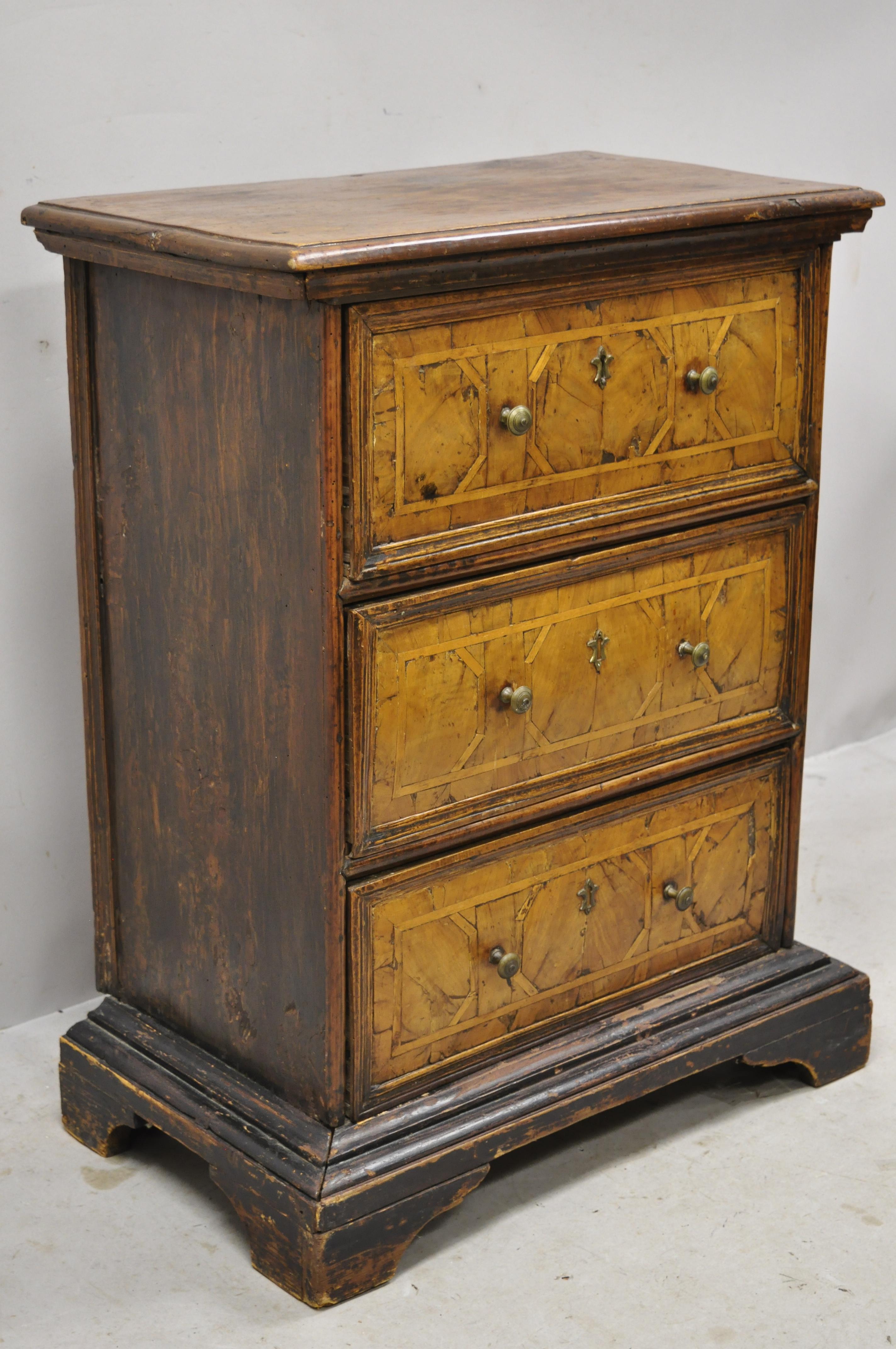 19th century Italian marquetry inlay walnut 3-drawer commode chest nightstand. Item features remarkable aged patina, marquetry or parquetry inlay, solid wood construction, beautiful wood grain, 3 drawers, solid brass hardware, circa 19th century.