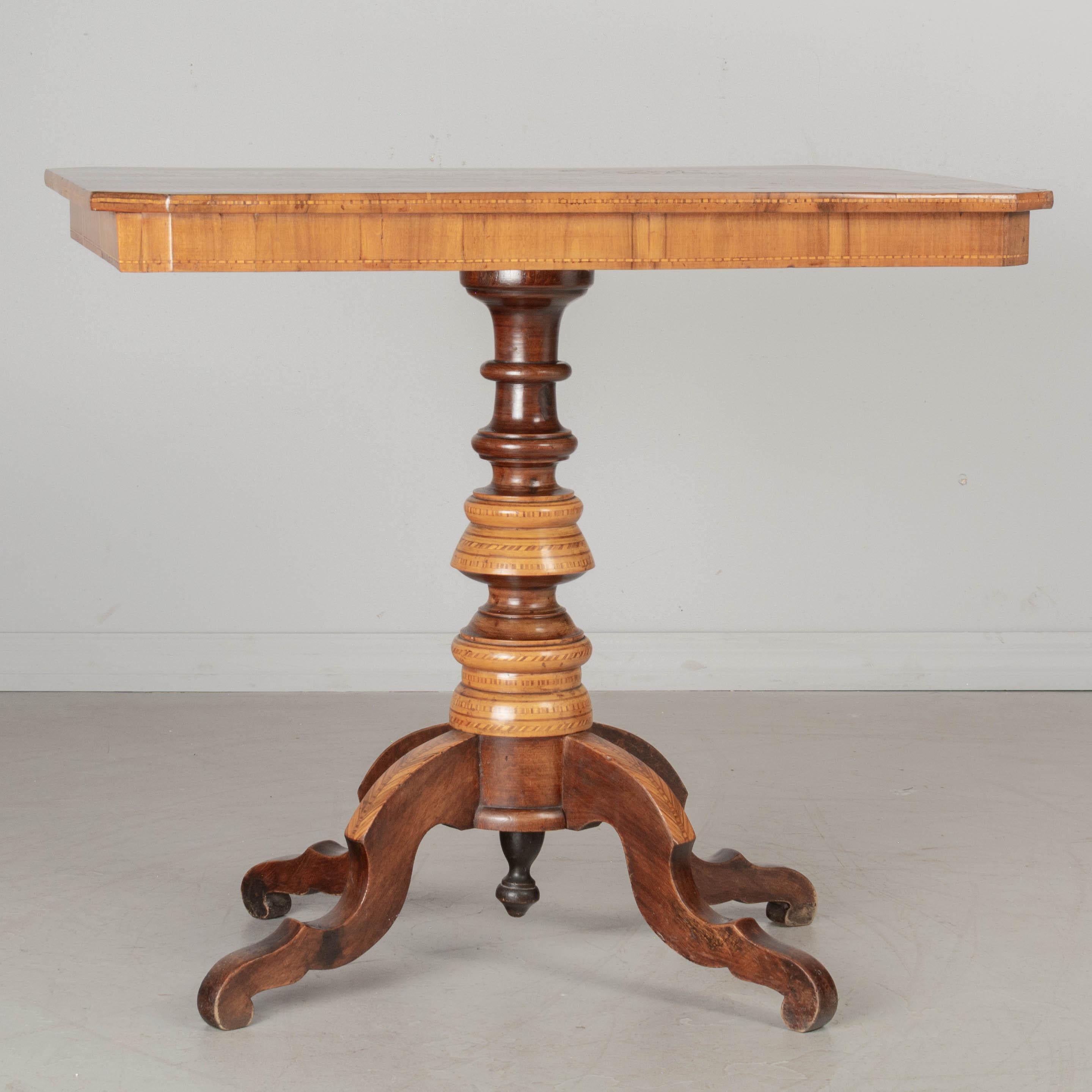 Hand-Crafted 19th Century Italian Marquetry Tilt-Top Center Table For Sale