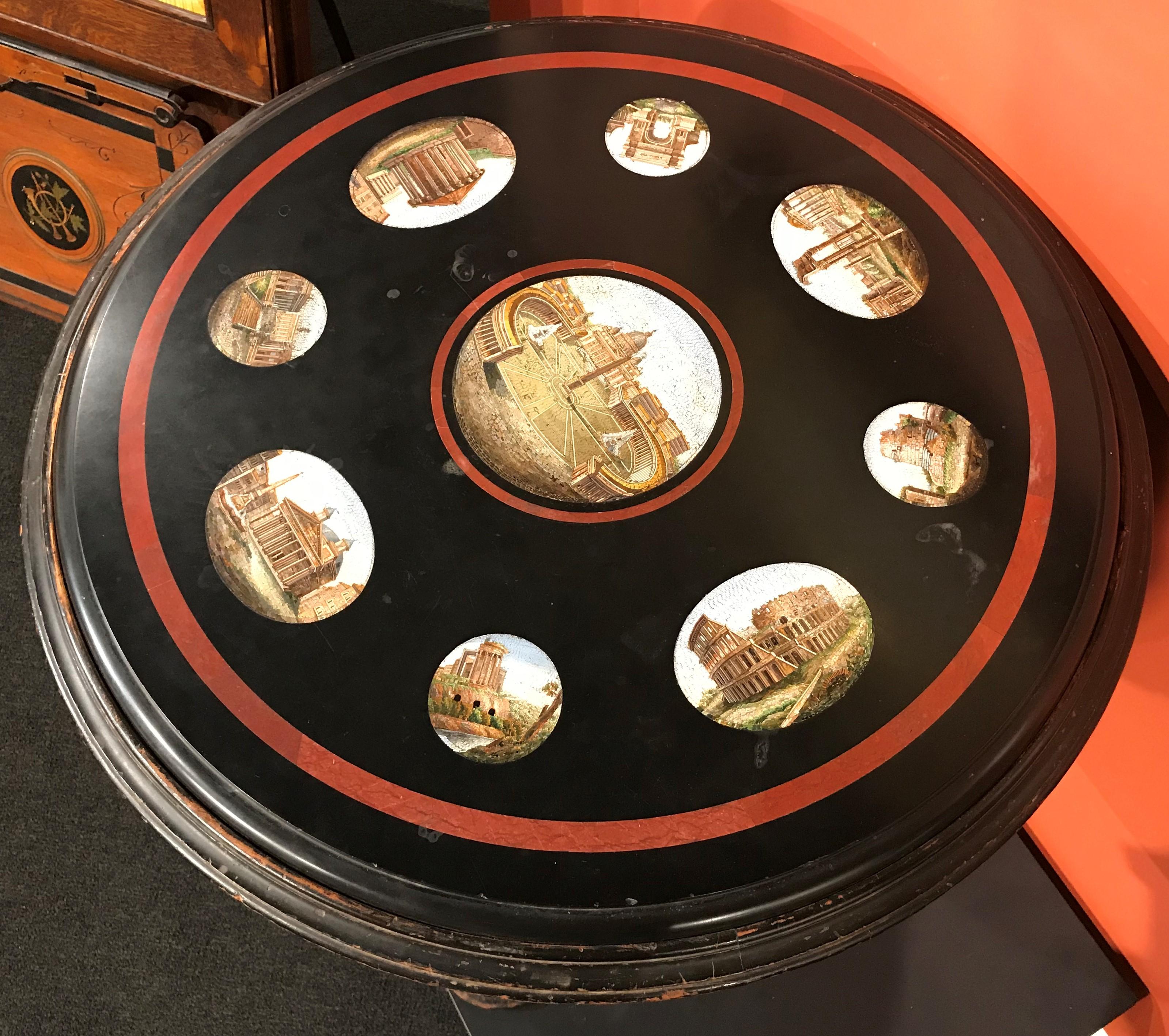 Ébénisé Table centrale ronde italienne du 19ème siècle en micro-mosaïque avec base sculptée en ébène en vente