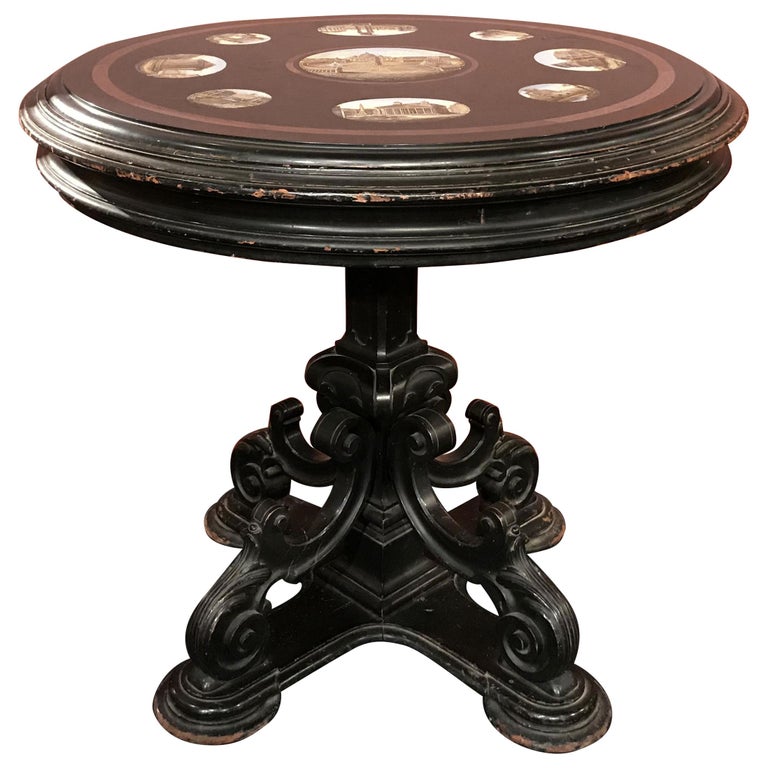 An exceptional 19th century Italian micro mosaic round center table featuring architectural scenes from Rome including a central scene of Saint Peter’s Basilica with a brick red marble band, surrounded by smaller oval scenes of the Colosseum, The