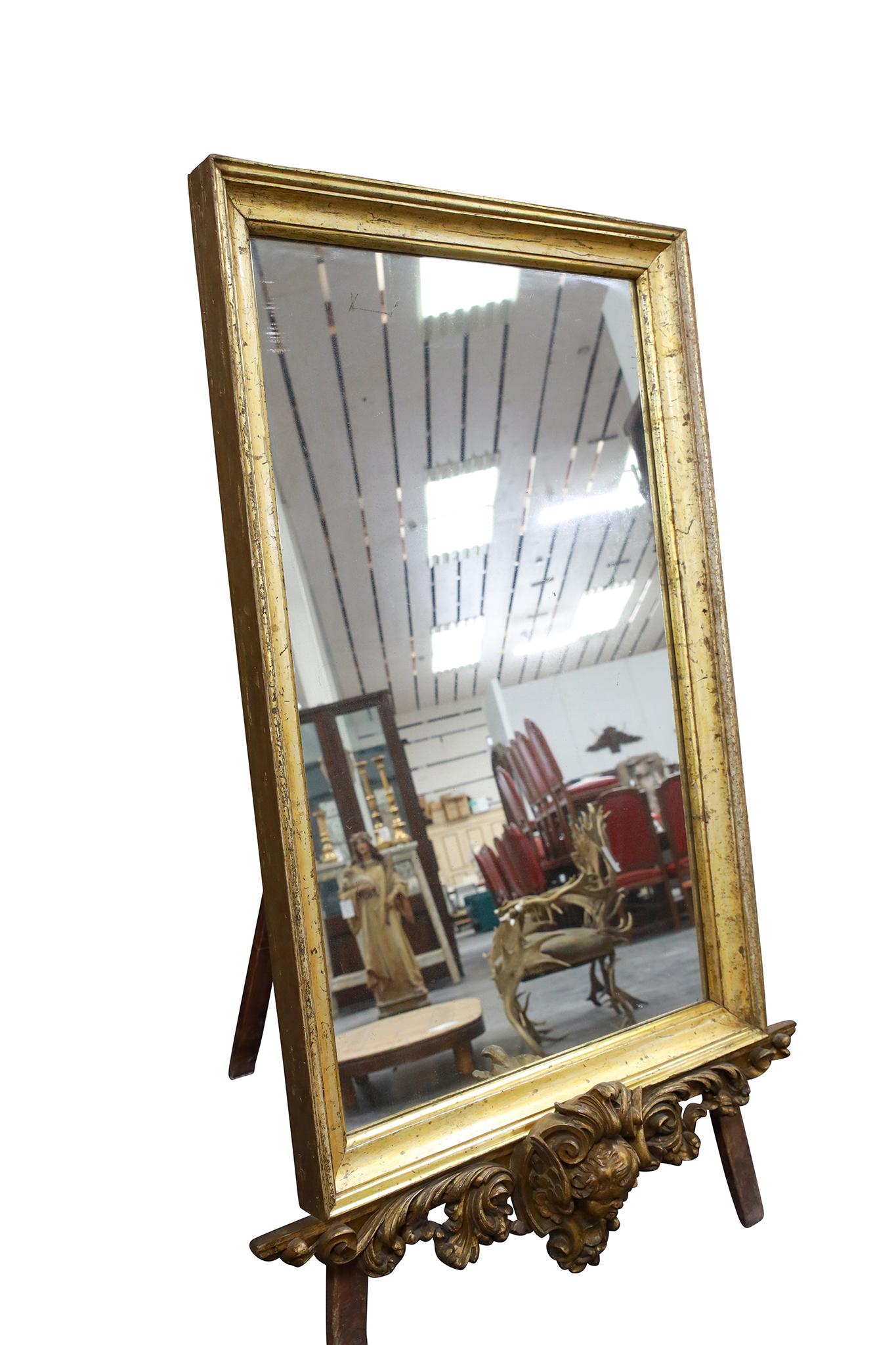 19th Century Italian Mirror with Cherub Head. Great carved wood decorative angel. Hangs easily on a wall.

Dimensions: 66