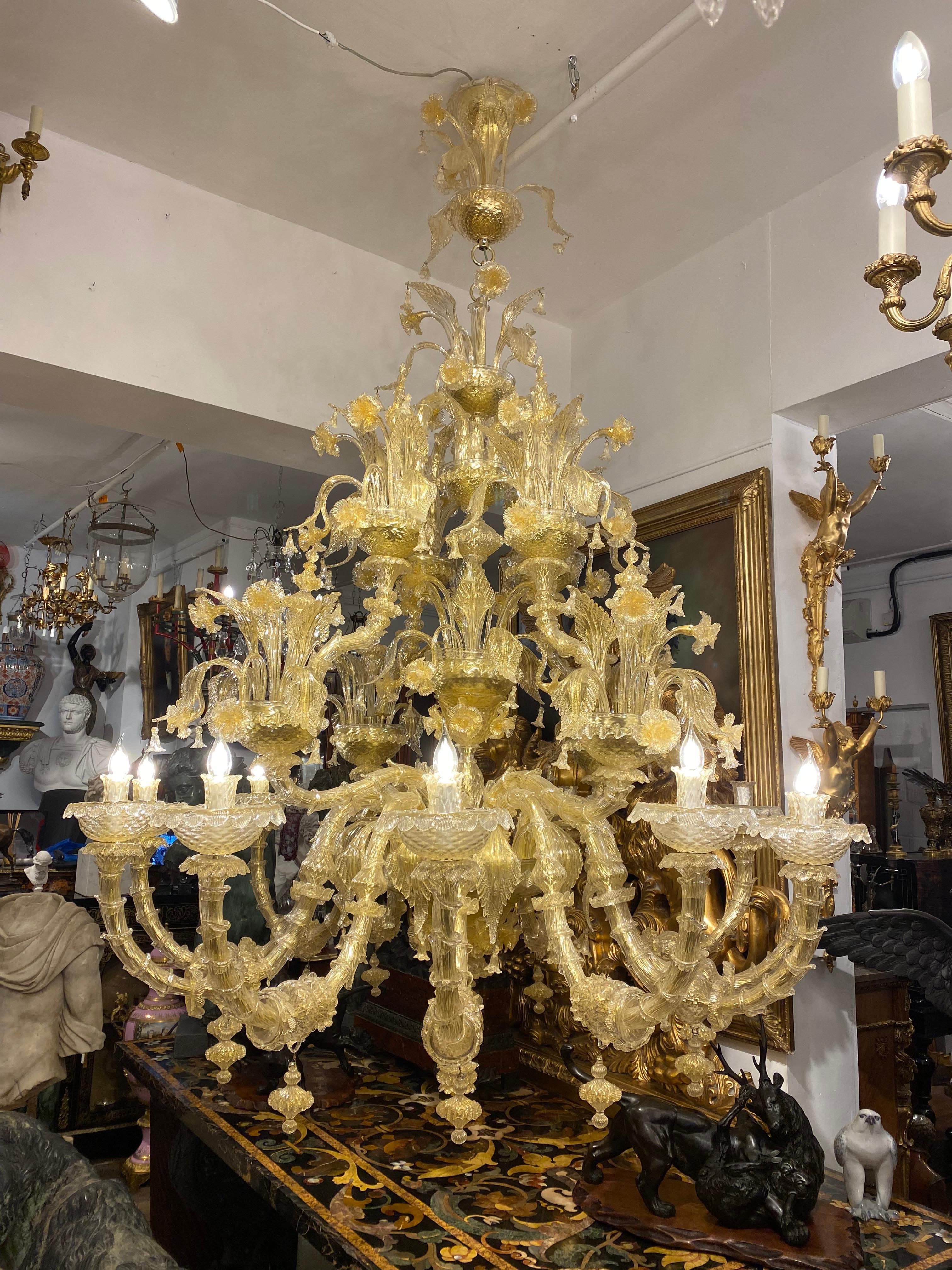 An incredible and monumental Italian 19th century Murano large chandelier. This is truly a magnificent chandelier, produced by the greatest Italian glass manufacturer in the world. With a bulbous central stem supporting floral decorated lights,