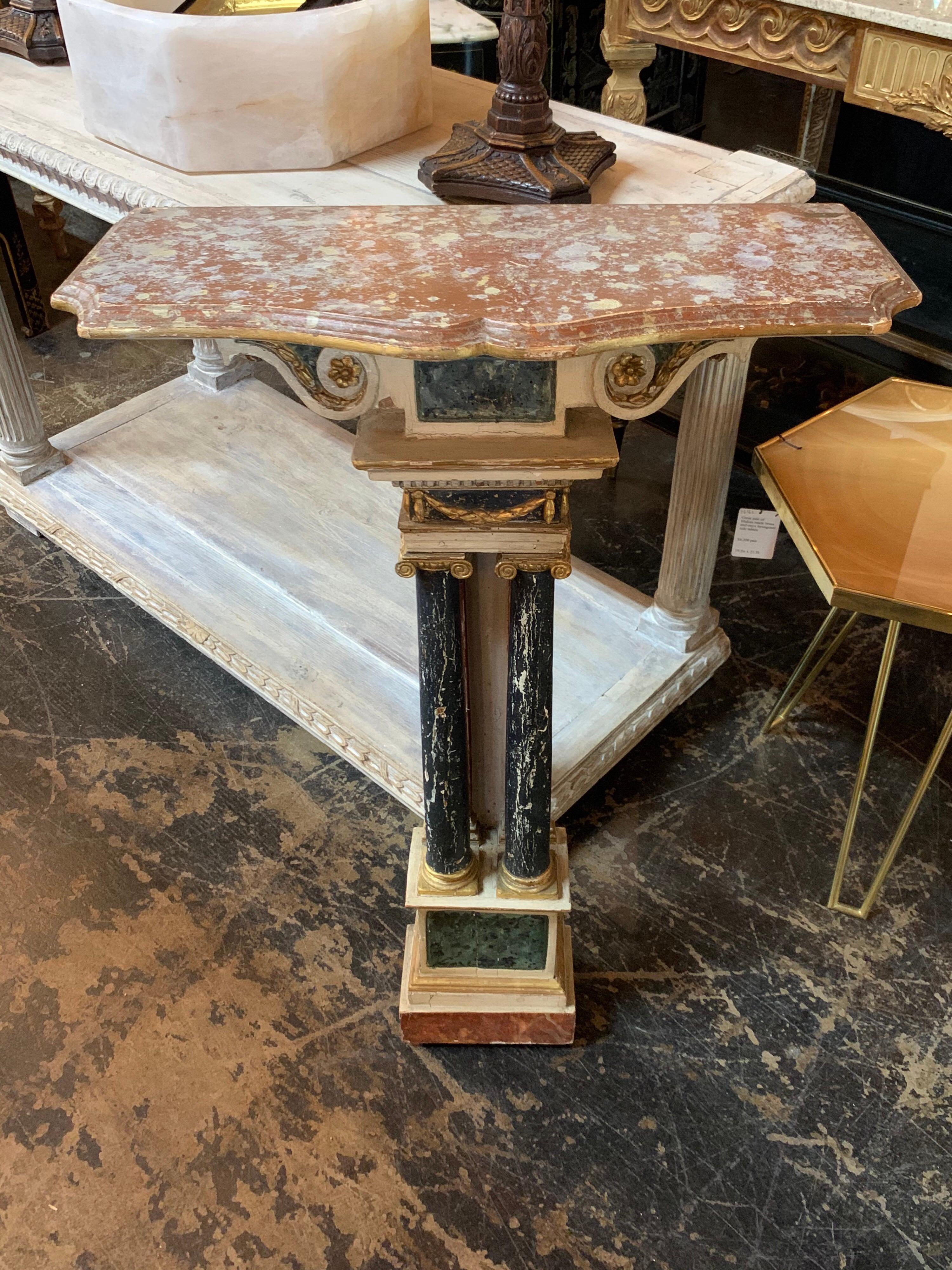 Hard to find narrow 19th century Italian painted console with marble top. Beautiful carved details on the base of the piece. Very elegant and great for small spaces!