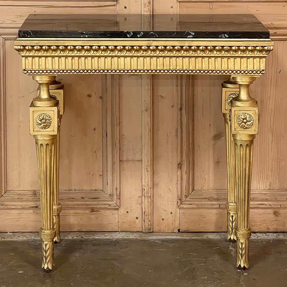 19th century Italian neoclassical giltwood console with Faux marble painted top is an amazing example of fine craftsmanship and timeless style, rendered by the master artisans of Milano! The top is so well painted one must touch it to realize that