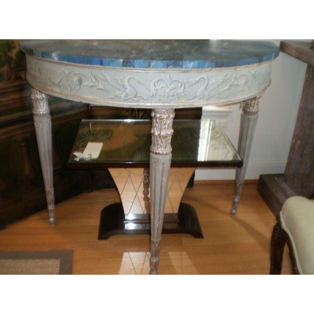 19th century Italian Neoclassical style painted and silver gilt console table.
Stunning freestanding 19th century Neoclassical style Italian hand painted and silver gilt console table, demi lune or sofa table with faux marble top. This lovely