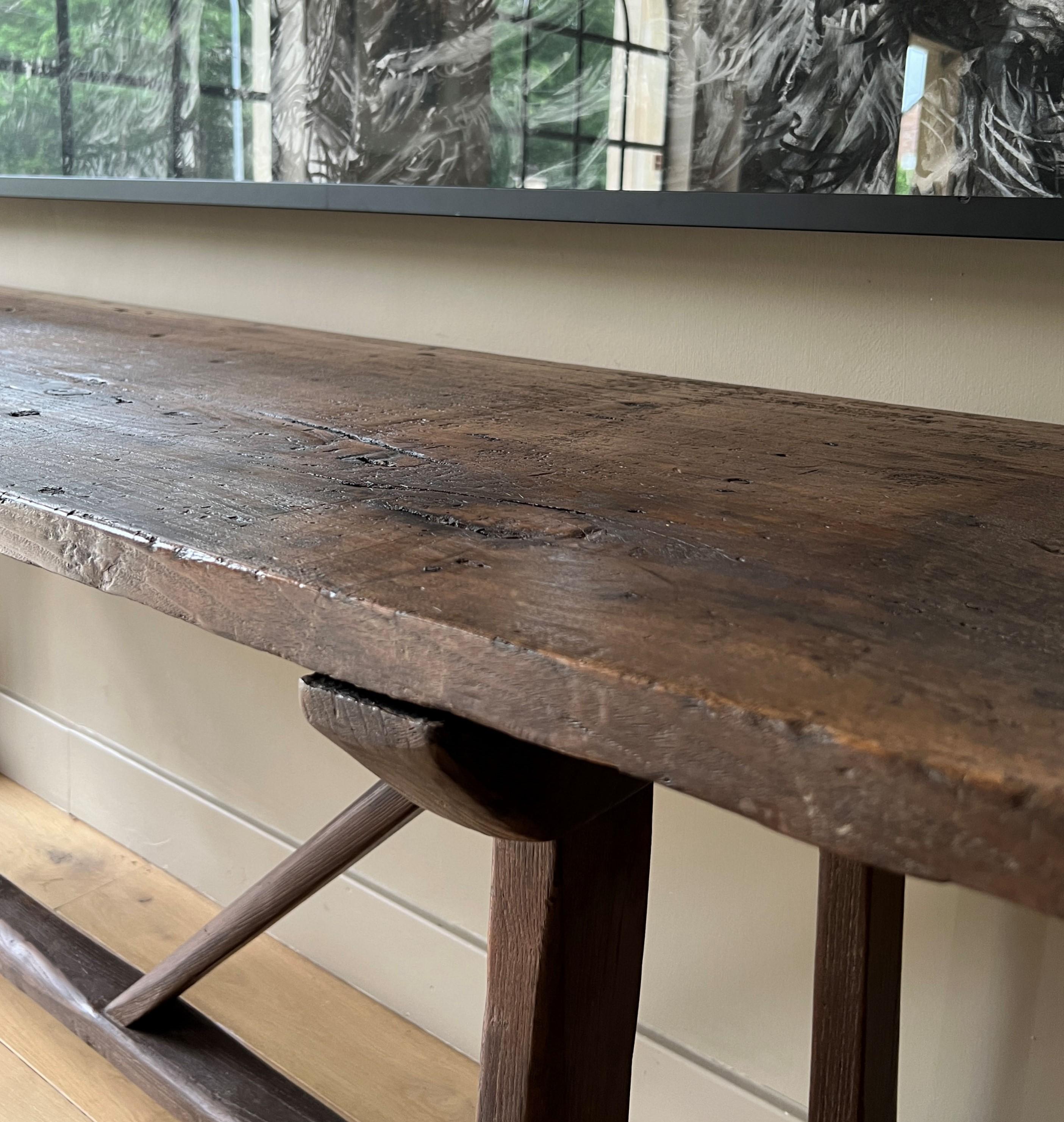 Chestnut 19th century Italian one slab trestle side table