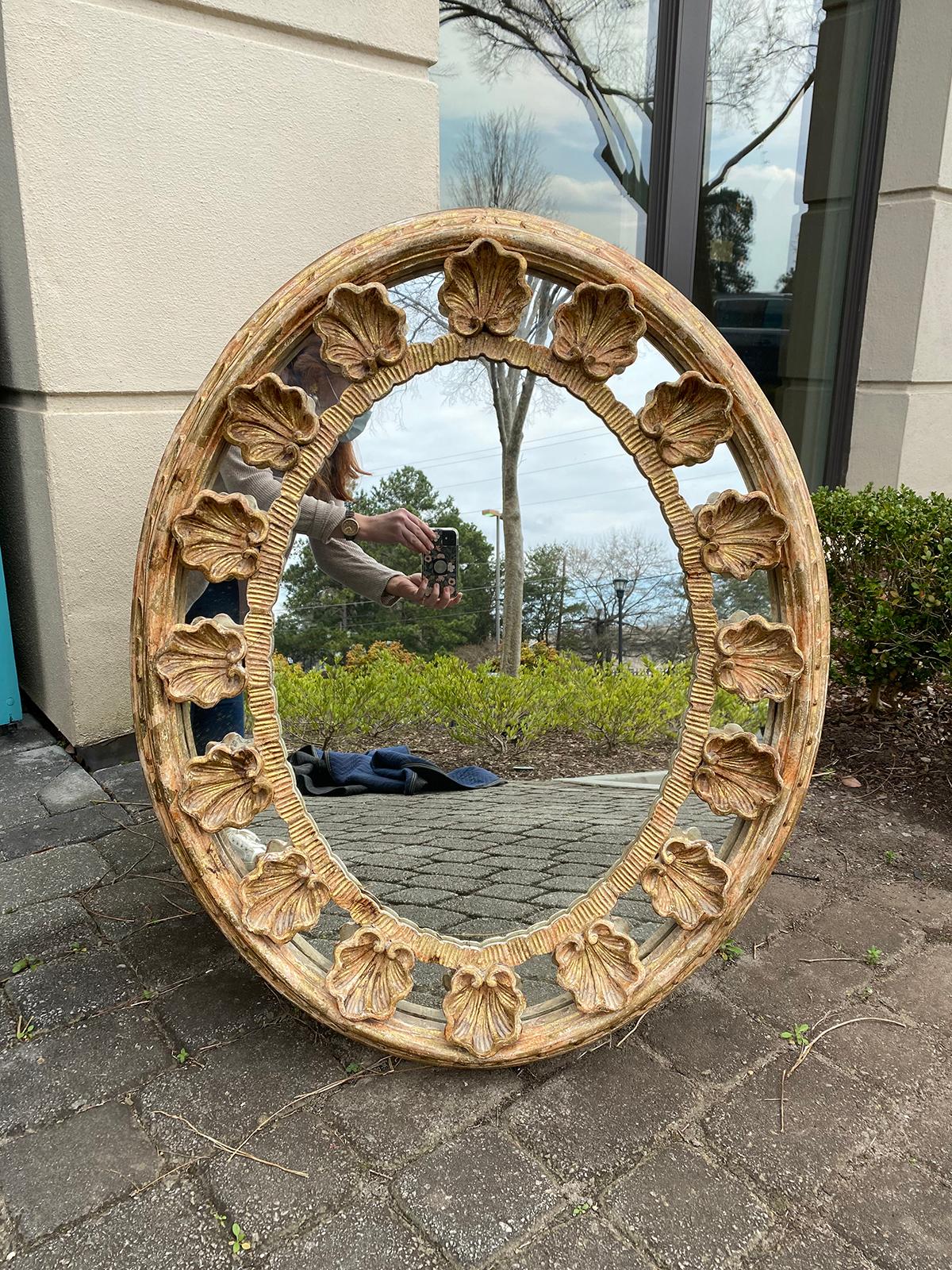18th-19th century Italian oval carved giltwood shell mirror with label 