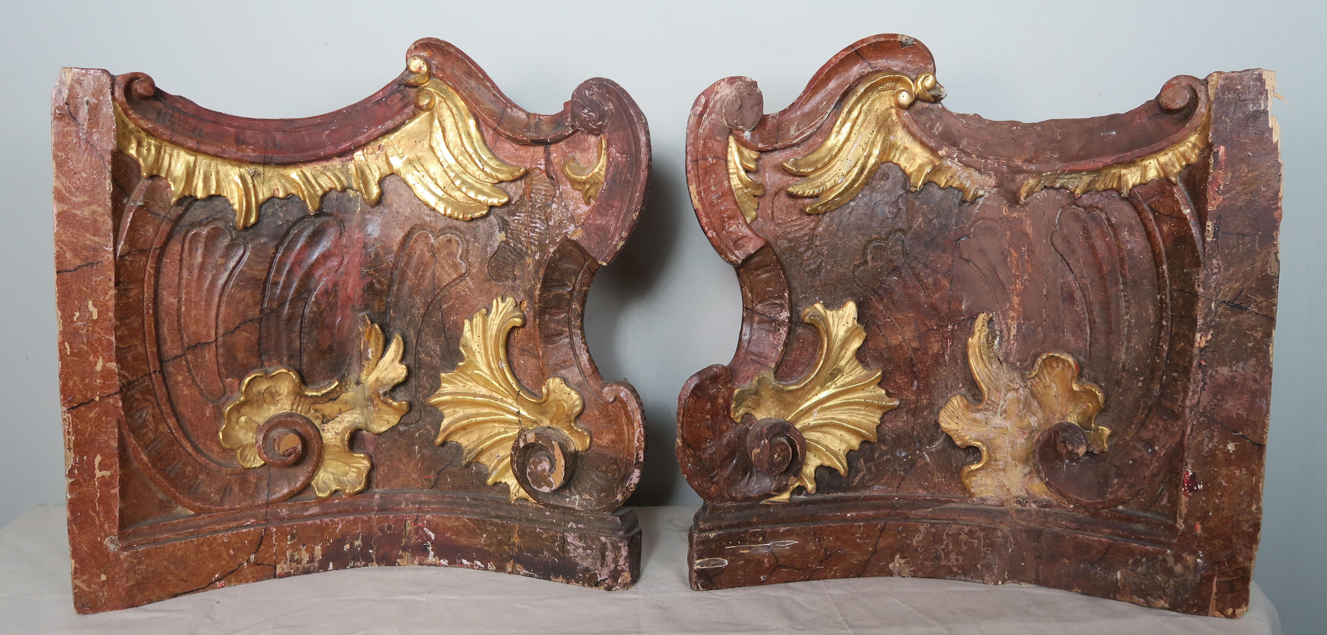19th century Italian painted and parcel-gilt carved wood architectural fragments. They would be beautiful mounted on Lucite bases or used during the building process.