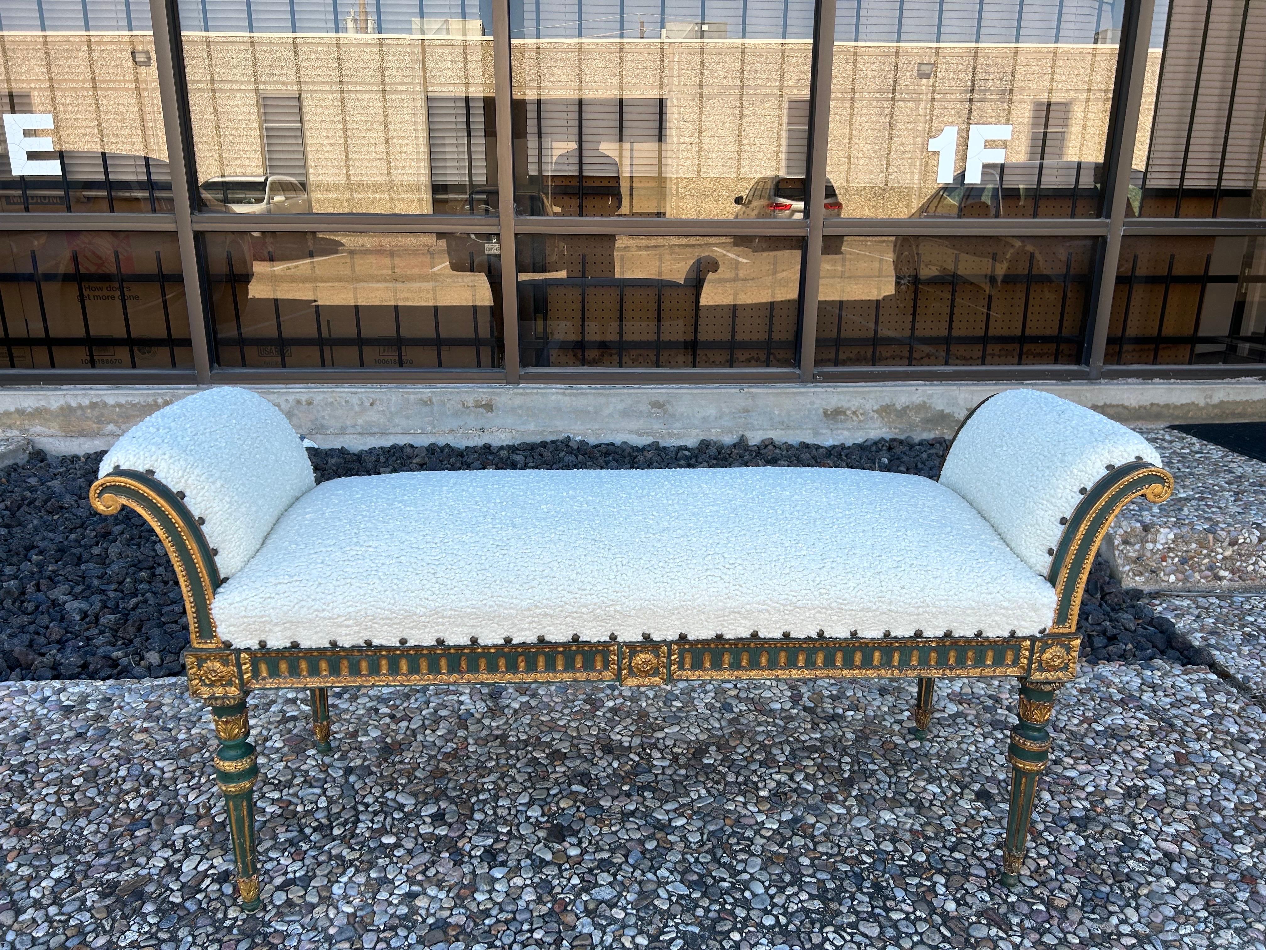 19th Century Italian Painted And Parcel Gilt Bench.
This stunning antique Italian Louis XVI style painted and giltwood bench or window seat is versatile enough to use in a living area, entrance hall or at the foot of a bed.
Newly upholstered in