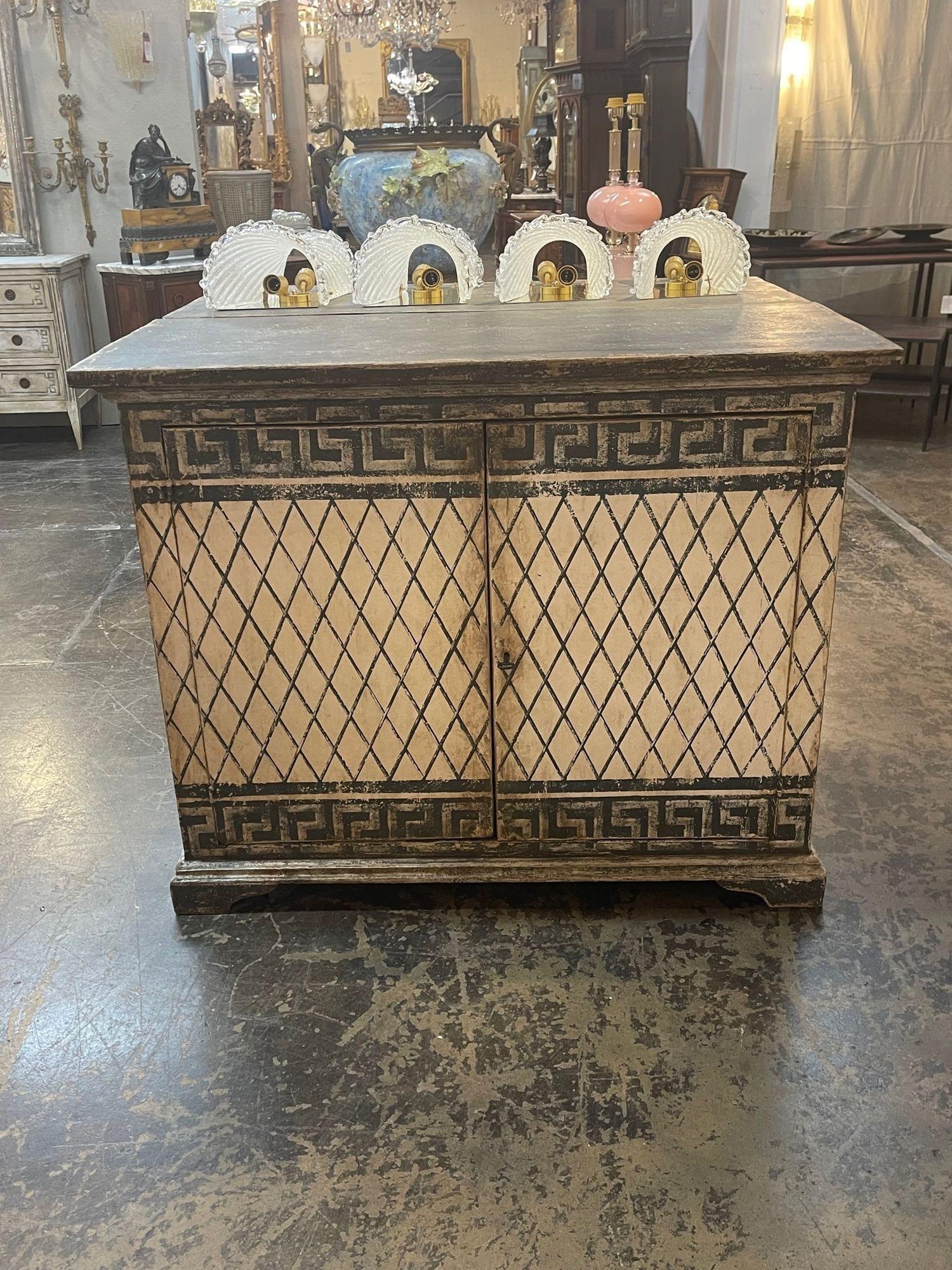 Handsome 19th century Italian painted buffets with Greek Key design. An interesting design with a beautiful patina. Lovely!