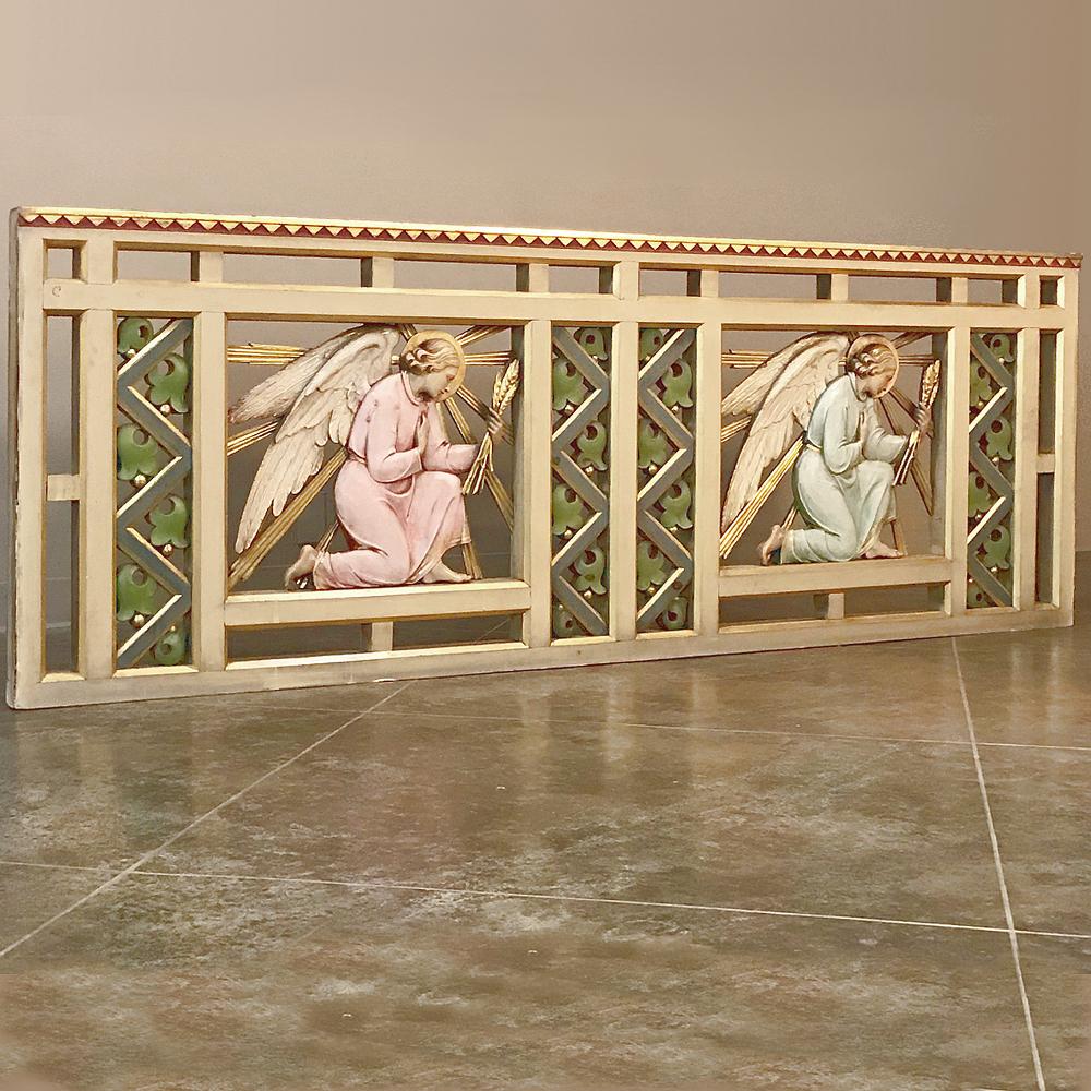 19th century Italian painted Communion railing with angels is a study in sculpture and the art of painted masterwork! Two angels holding laurel branches are posed in a kneeling position, with colorful yet pastel tones used to highlight their