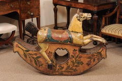 Caballo balancín italiano del siglo XIX de madera pintada