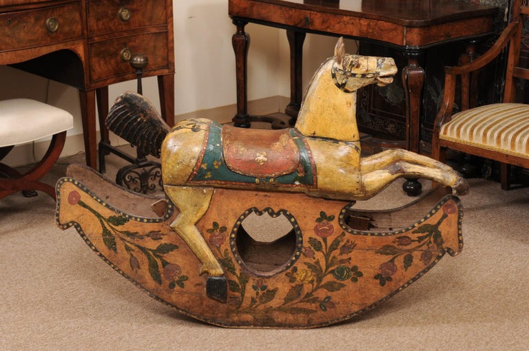 19th century Italian painted wood rocking horse.