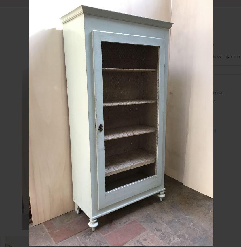 19th century Italian painted wood little wardrobe with shelves and metal mesh door.
  