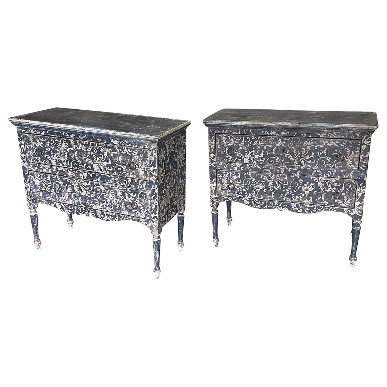 A late 19th Century, antique Italian Arte Povera pair of sculptural nightstands made of hand crafted painted Pinewood, in good condition. The detailed large bed side tables are composed with two drawers, particularized by round bronze handles. The