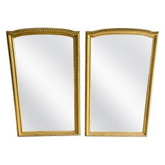 Paire de grands miroirs italiens anciens en bois de pin doré du 19ème siècle