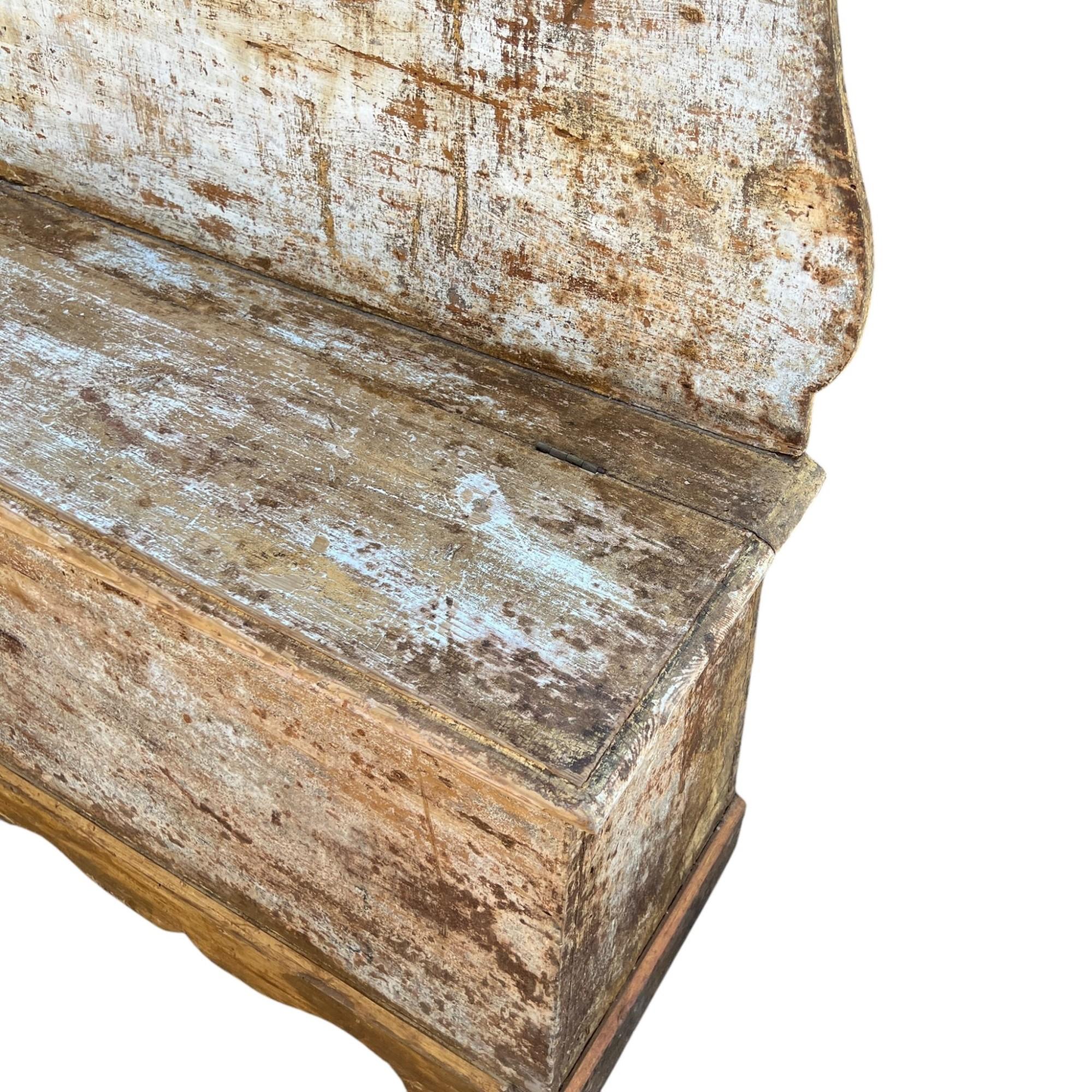 Set of two beautifully proportioned benches with scraped paint finish.  The seat lifts up for storage.