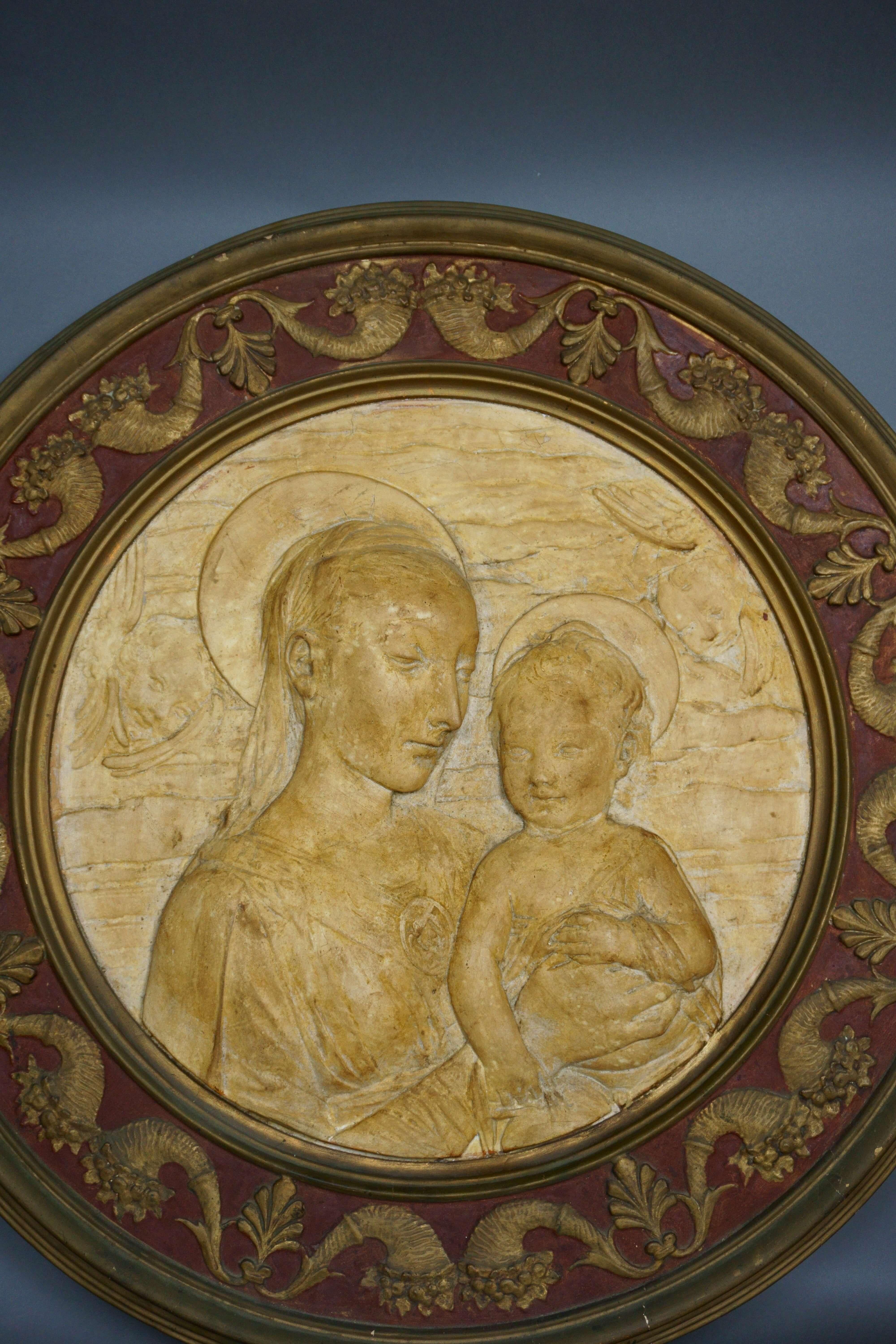 Large bas-relief in papier-mâché tondo, Madonna with Child, Florence, 19th century.
From a similar model exposed to Spedale degli Innocenti in Florence.

 