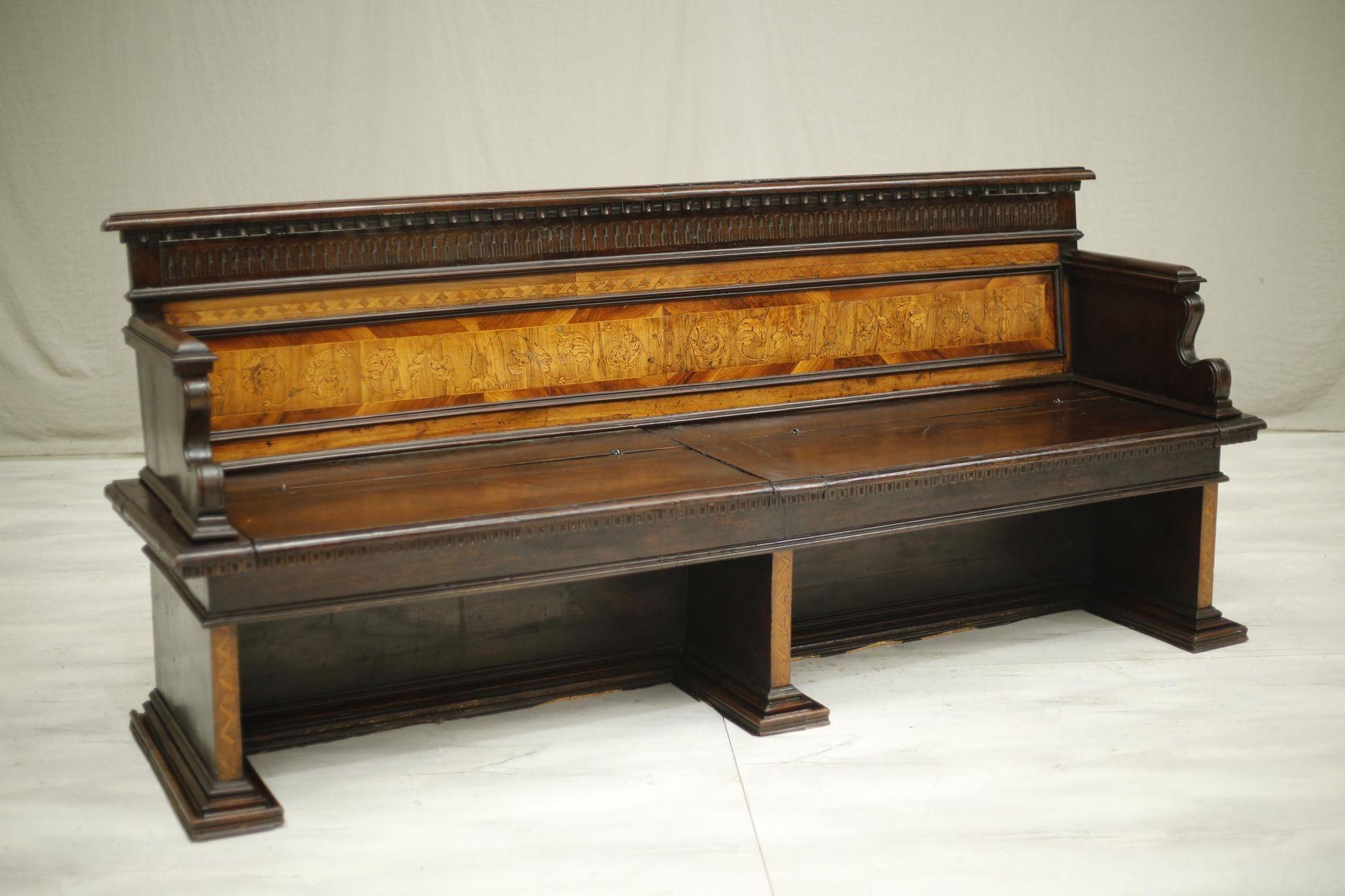 This is a very nice quality 19th century Italian bench. The penwork detail in the back is such a wonderfukl detail and a great contrast to the dark finish to the body of the piece. The details continue to the leg fronts which is a great touch. The