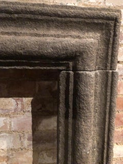 19th Century Italian Peperino Stone Bolection Fireplace