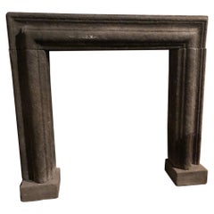 19th Century Italian Peperino Stone Bolection Fireplace