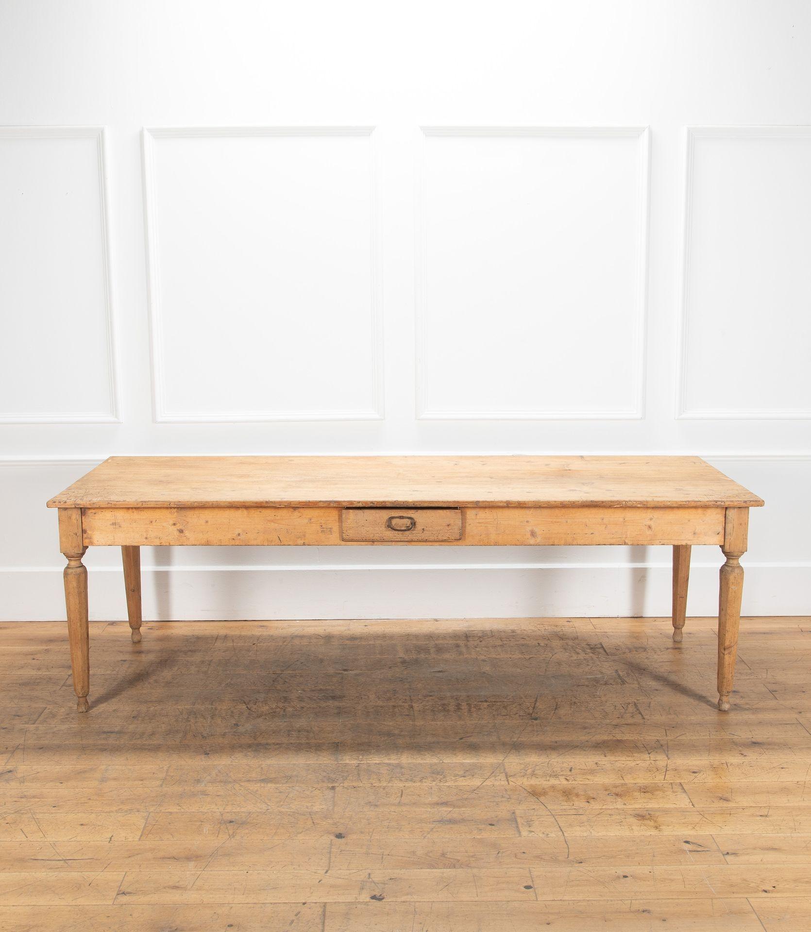 A generously deep 19th Century Italian, Umbrian pine table with one small drawer.
Shaped legs and a three plank top. Some cutting marks on the table top and slight wear as one might expect.
Rustic, honest and charming.
With some restoration to the