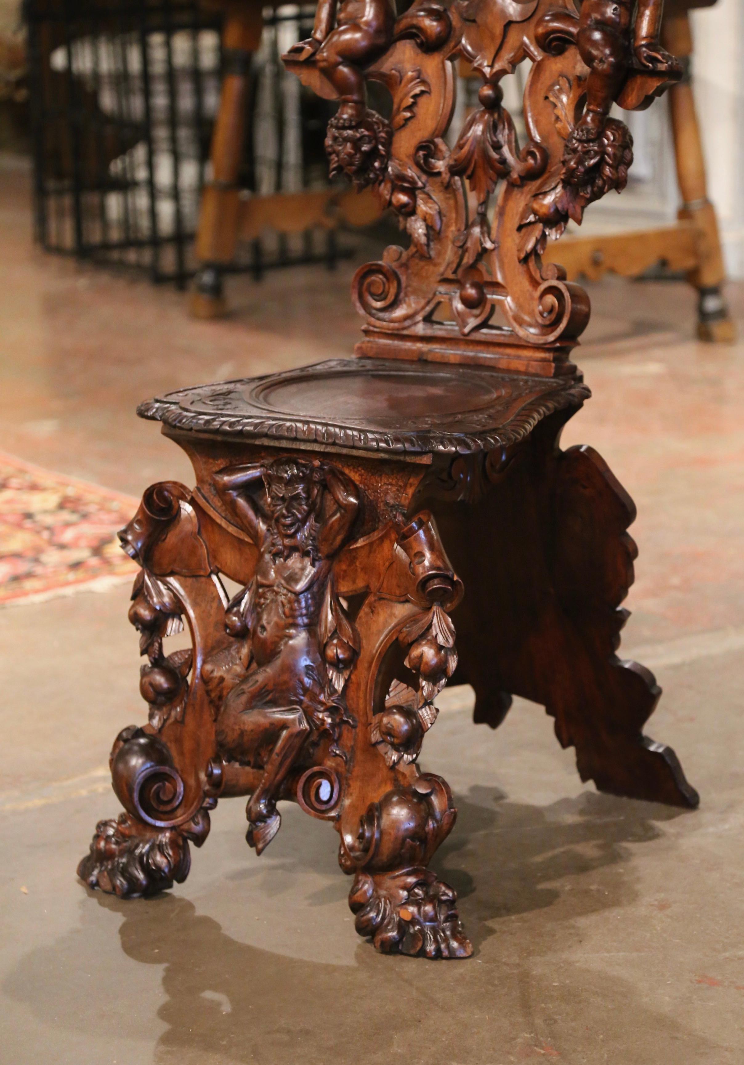 19th Century Italian Renaissance Carved Walnut Sgabello Hall Chair with Putti In Excellent Condition In Dallas, TX